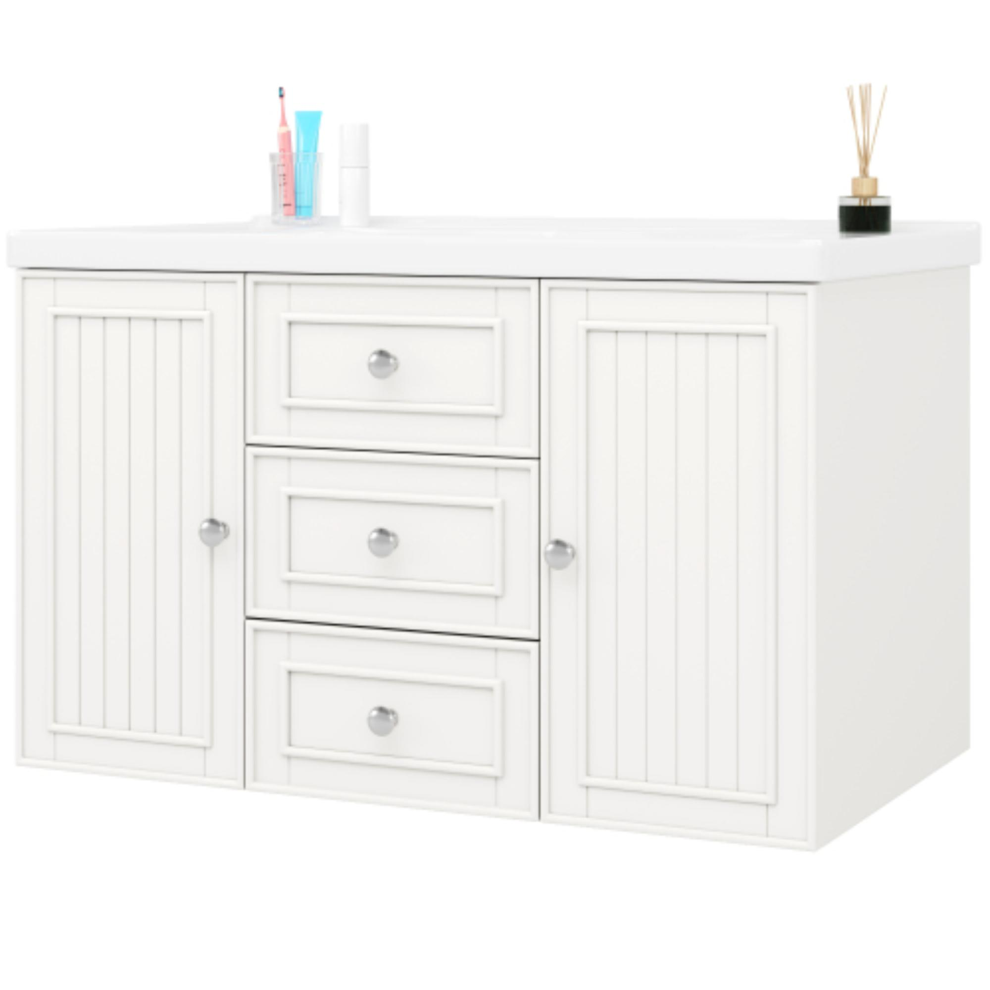 Weißer Badezimmer-Waschtisch. Waschbecken, Schubladen und Schränke. Enthält Zahnbürste, Zahnpasta und Aromadiffusor.