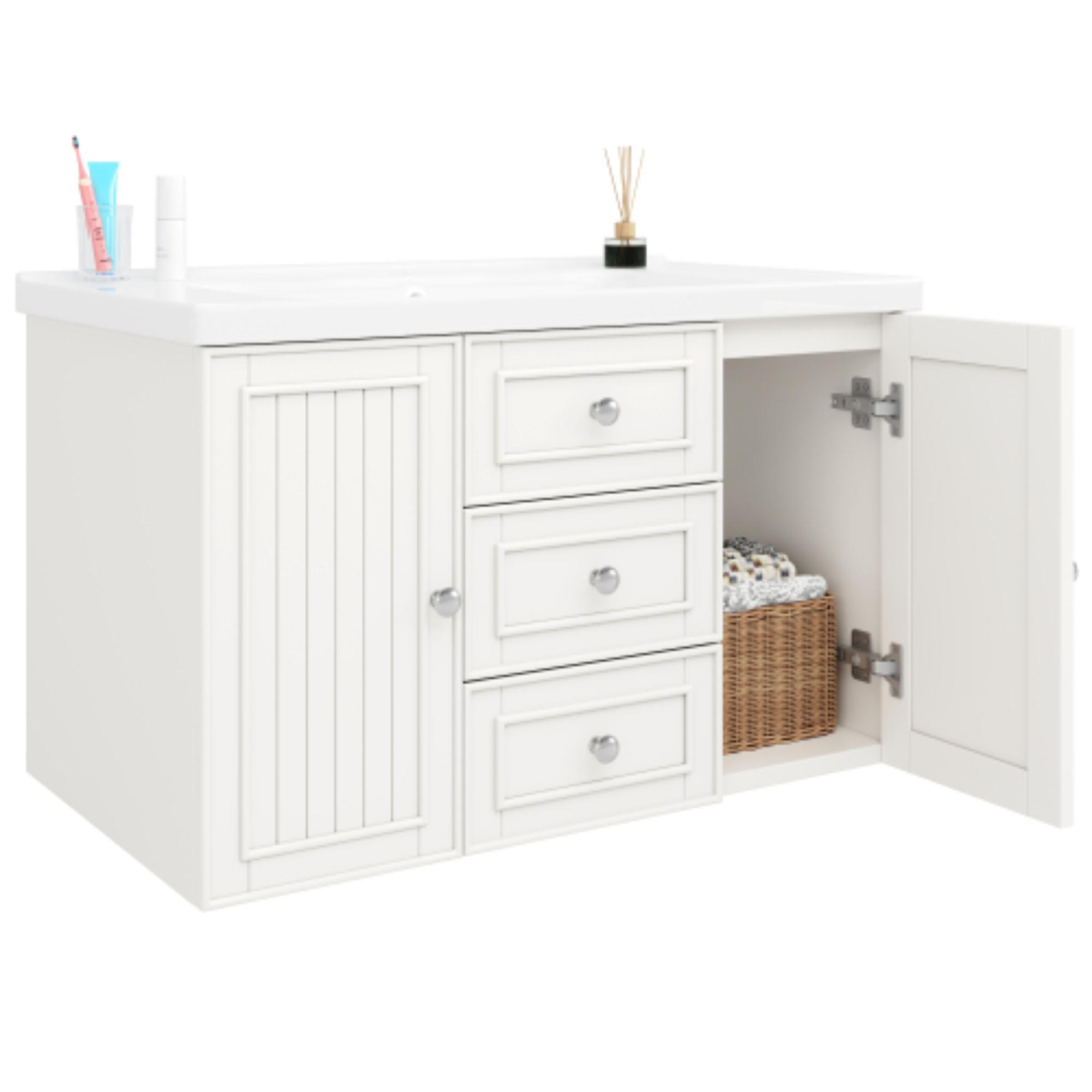 Weißer Badezimmerwaschtisch mit offenem Schrank. Enthält Handtücher in einem Weidenkorb. Hat Waschbecken und Schubladen.