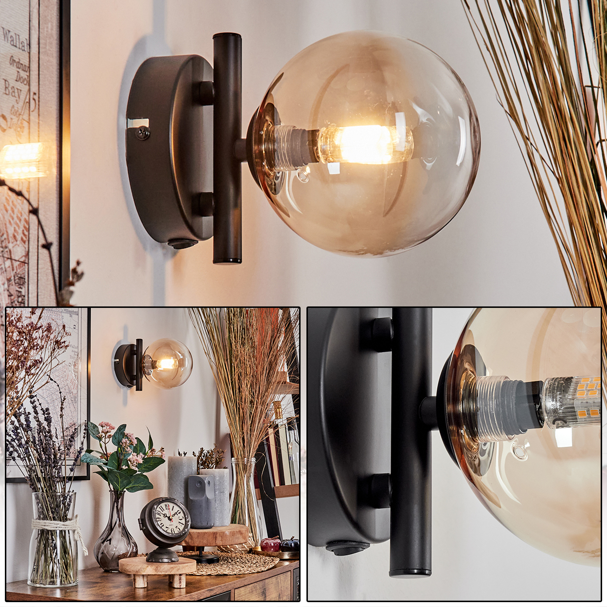 Schwarze Wandlampe mit bernsteinfarbener Glaskugel an einer weißen Wand. Details im Bild.