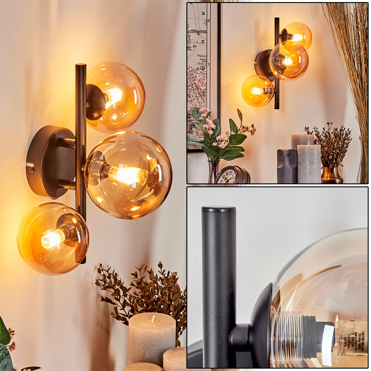 Wandlampe mit drei Glaskugeln, braun und klar, auf einem schwarzen Metallrahmen.