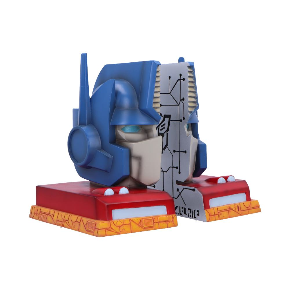 Optimus Prime hoofdfiguur op een rood en geel voetstuk. Blauwe kop, rode basis, gele accenten. Witte achtergrond.