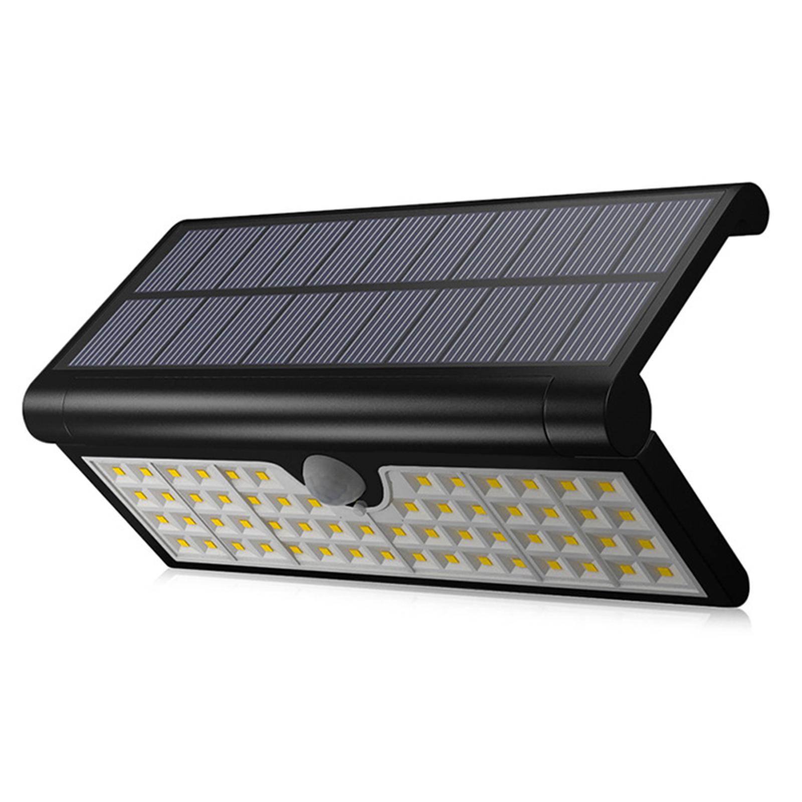 Schwarzes Solarpanel mit Bewegungssensor und LED-Leuchten. Weißer Hintergrund.
