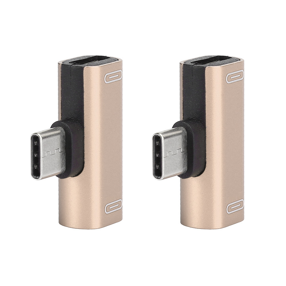 Zwei goldene USB-C-Adapter. Jeder Adapter hat einen USB-C-Anschluss und einen USB-C-Stecker im rechten Winkel.