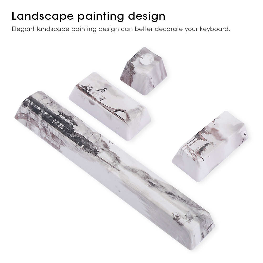 Vier Tastenkappen mit Landschaftsmalerei-Design auf weißem Hintergrund.