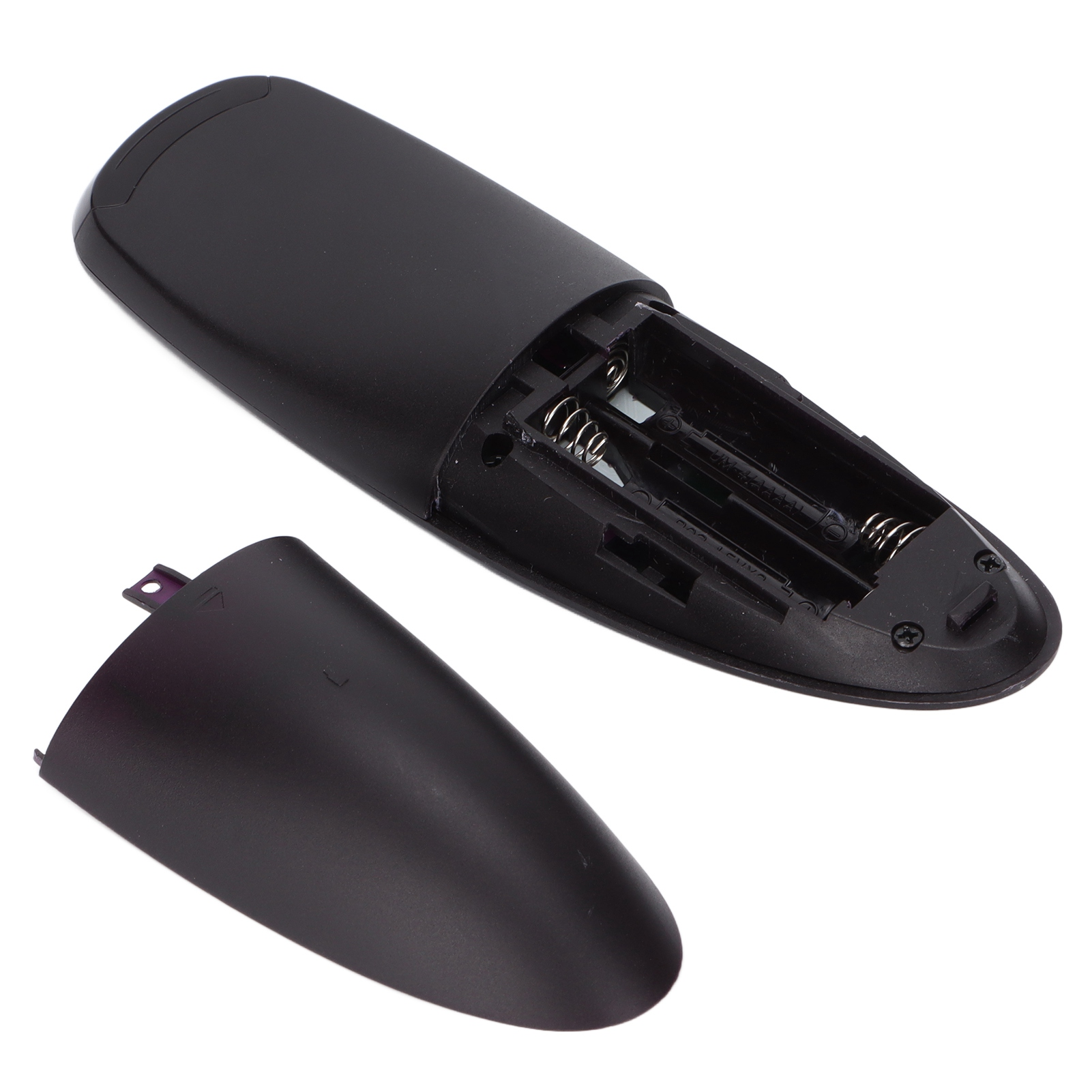 Eine schwarze Fernbedienung, geöffnet, um das Batteriefach ohne Batterien zu zeigen.