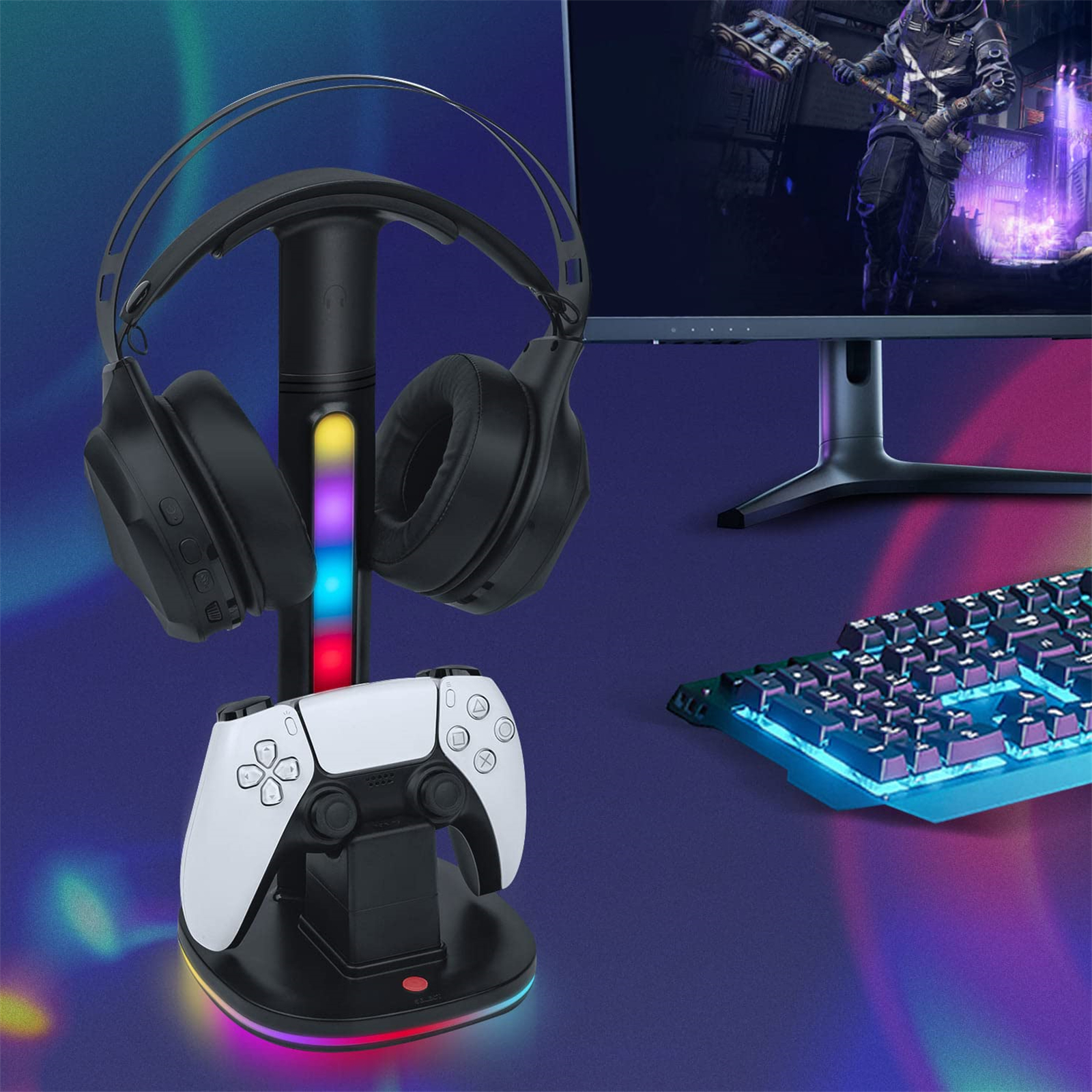 Schwarze Kopfhörer, weißer Controller und Ständer mit RGB-Beleuchtung. Ein Computermonitor und eine Tastatur im Hintergrund.