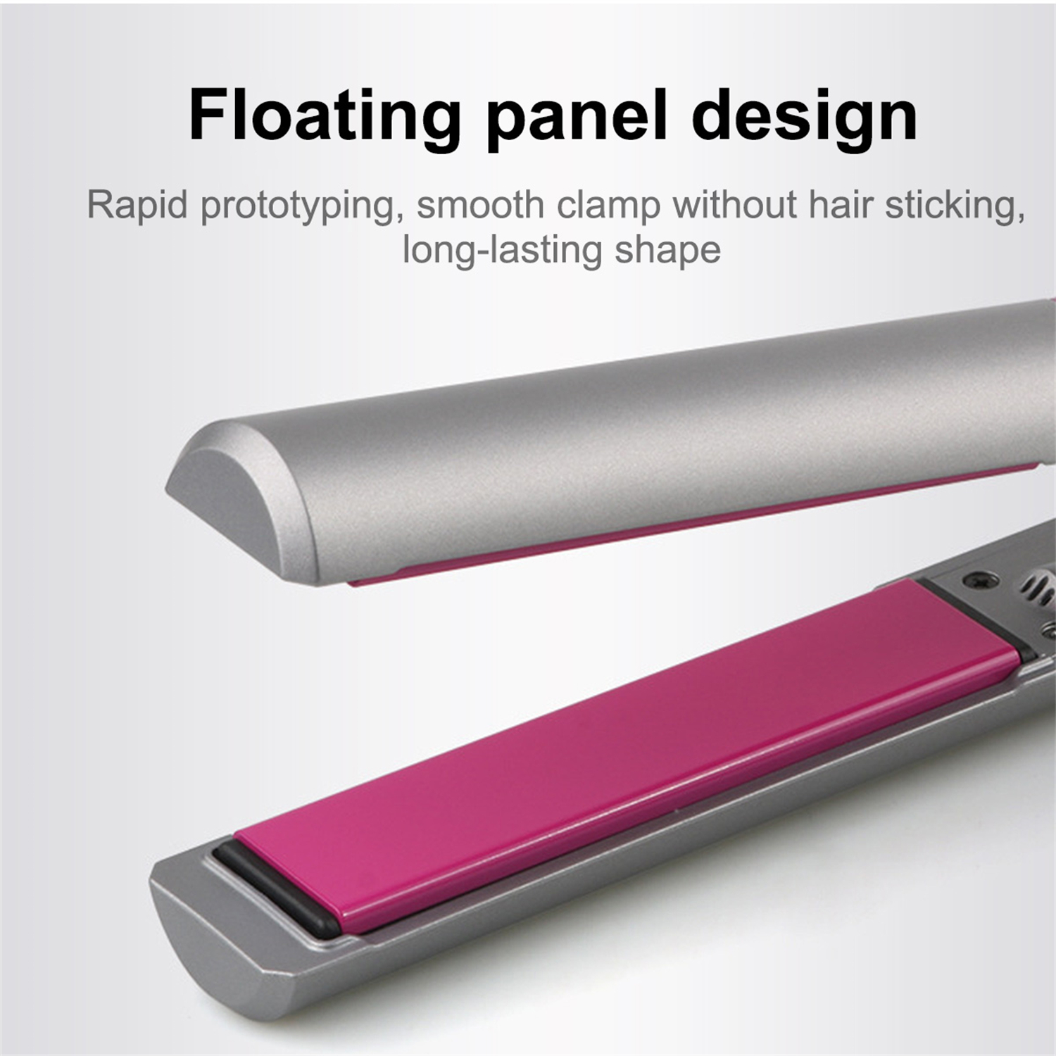 Nahaufnahme eines Haarglätters mit rosa Platte und grauem Äußeren. Der obere Teil ist offen.