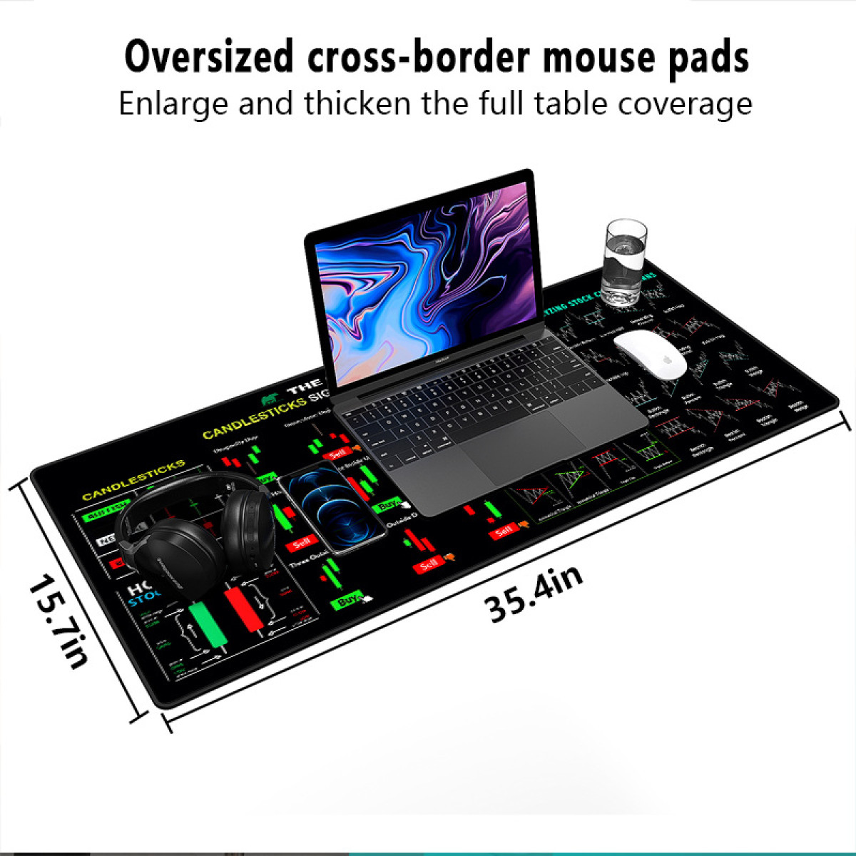 Een laptop, muis en koptelefoon op een zwarte muismat met grafieken en diagrammen.