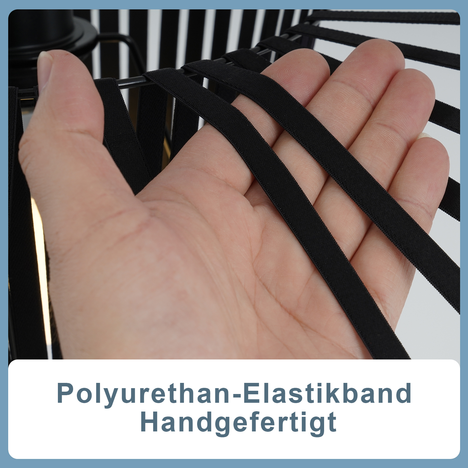 Primo piano della mano di una persona che tiene una fascia elastica nera, con testo.