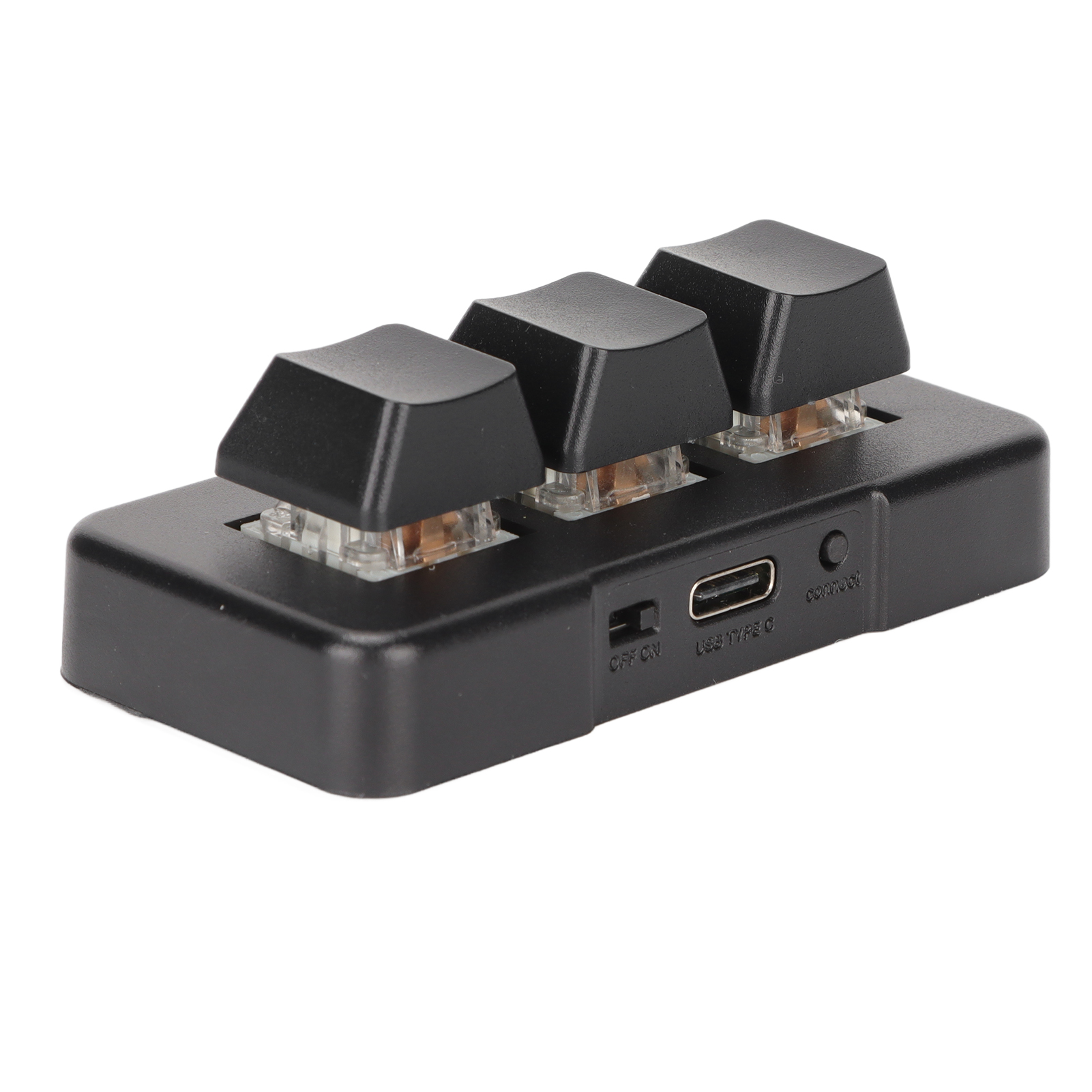 Drei schwarze mechanische Tastaturschalter auf einer schwarzen Basis, USB- und Stromanschlüsse.