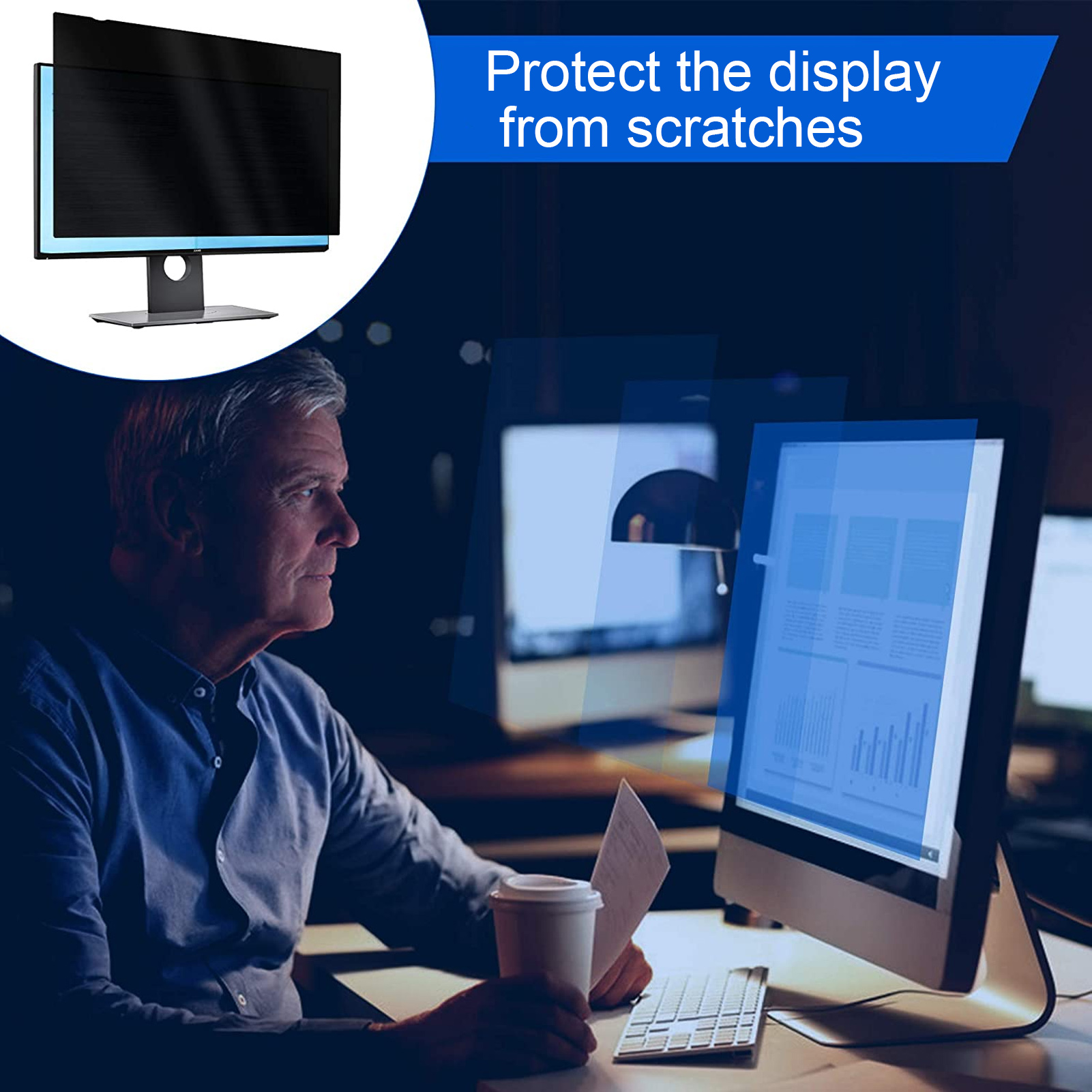 Ein Mann arbeitet in einem dunklen Raum mit einem Computer, mit einem Bildschirmschutz auf dem Monitor.