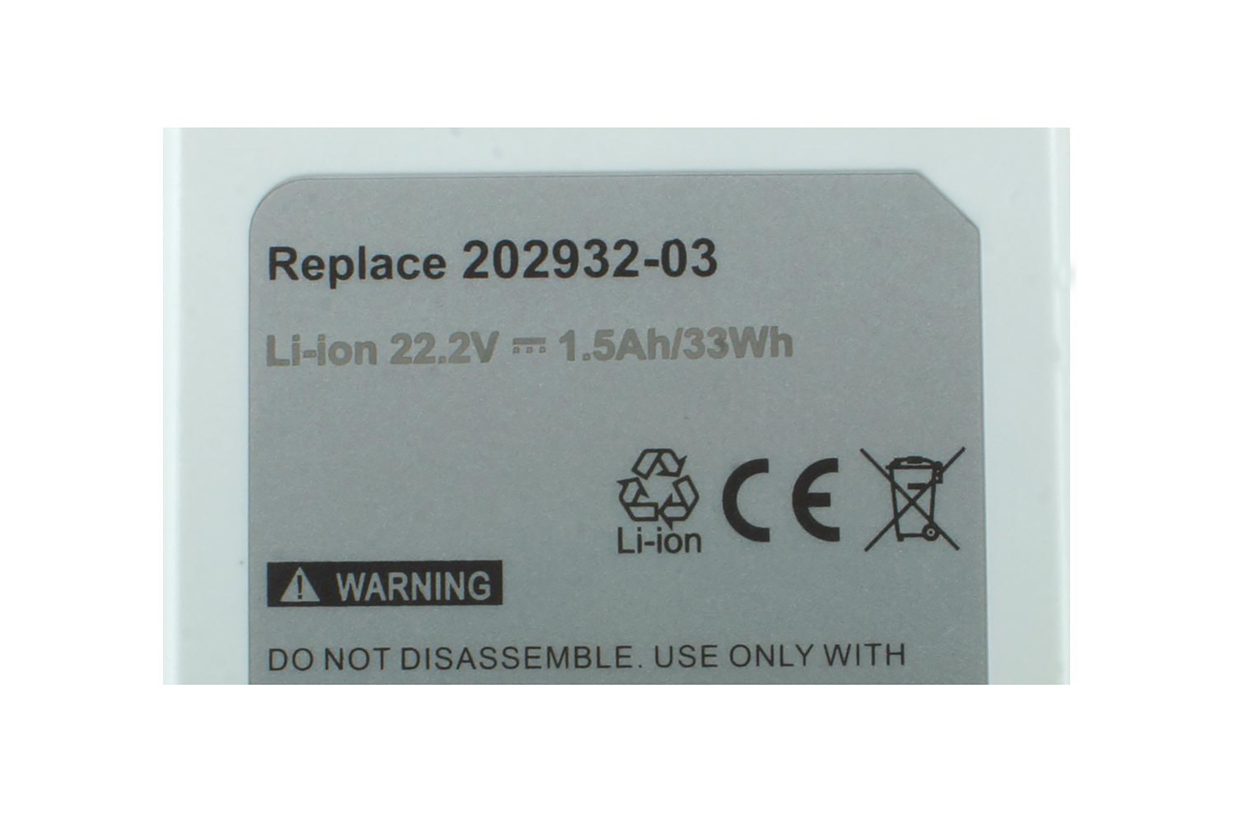 Primo piano dell'etichetta della batteria con avvertenze e specifiche, tra cui 22,2 V, 1,5 Ah.
