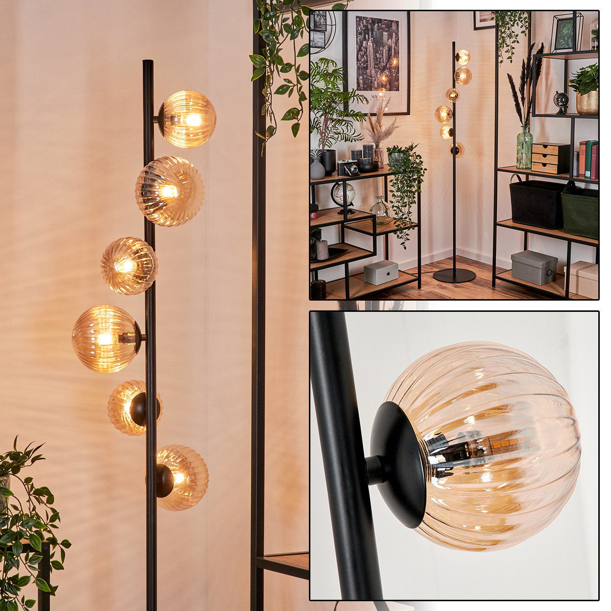 Schwarze Stehlampe mit sechs bernsteinfarbenen Glaskugelleuchten. Hintergrund: Regale, Pflanzen, Bild.
