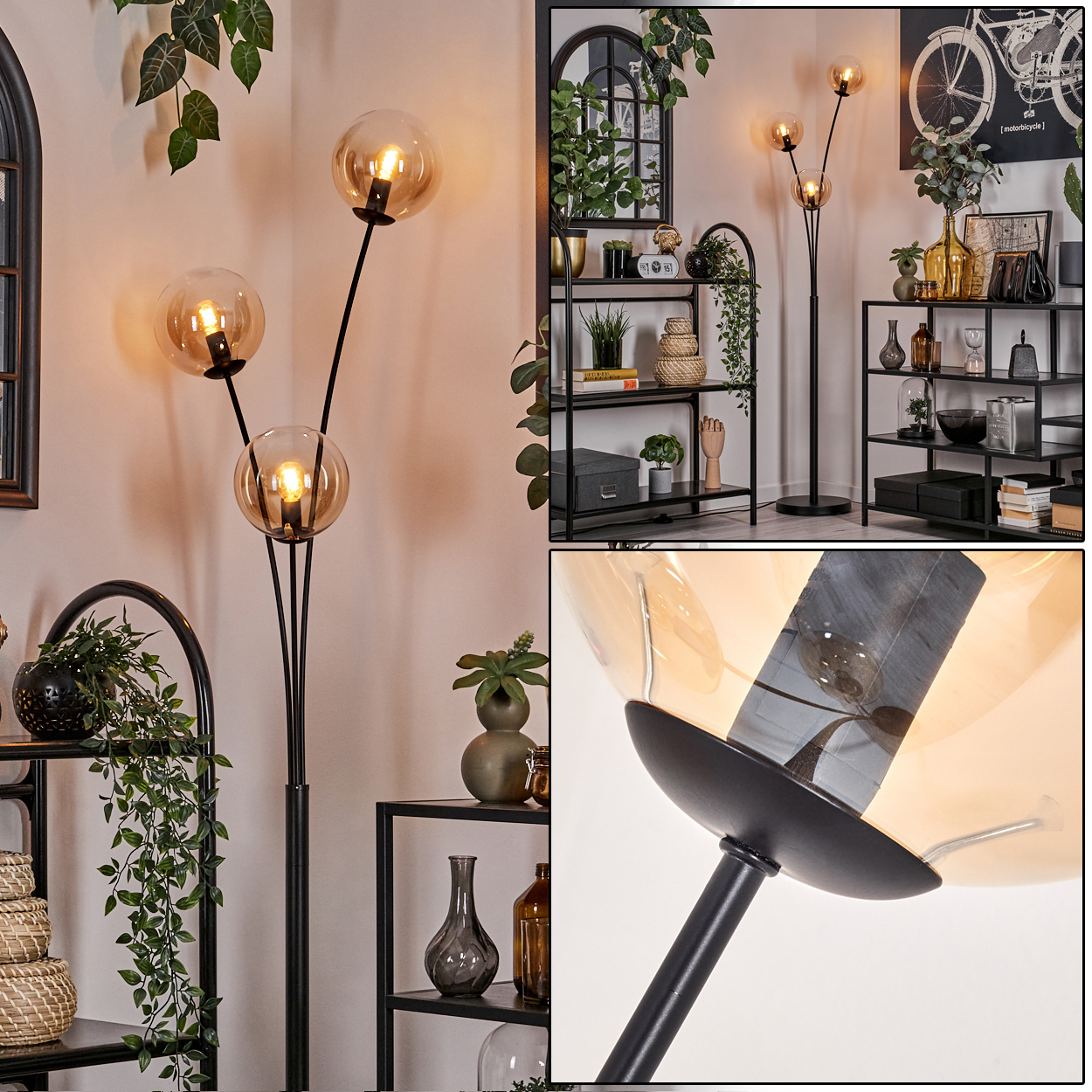 Schwarze Stehlampe mit drei bernsteinfarbenen Glaskugelleuchten. Hintergrund: Regale, Pflanzen, Spiegel.
