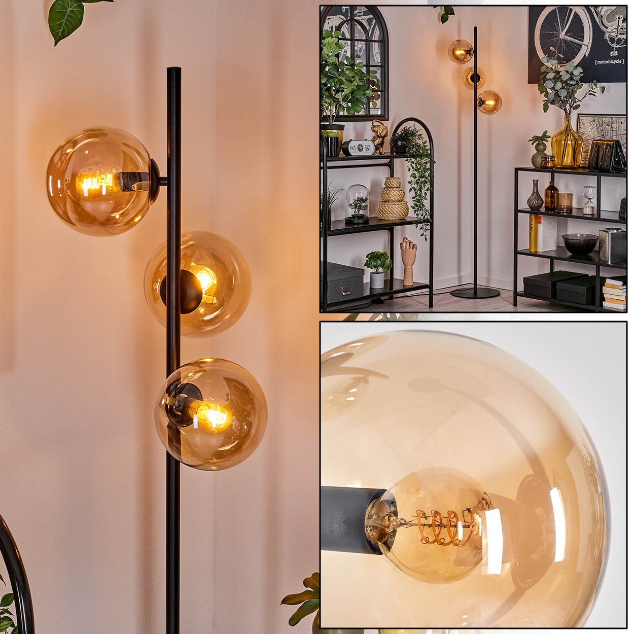 Stehlampe mit drei Glaskugelleuchten, mit schwarzem Stiel und Fuß, in einem Raum.