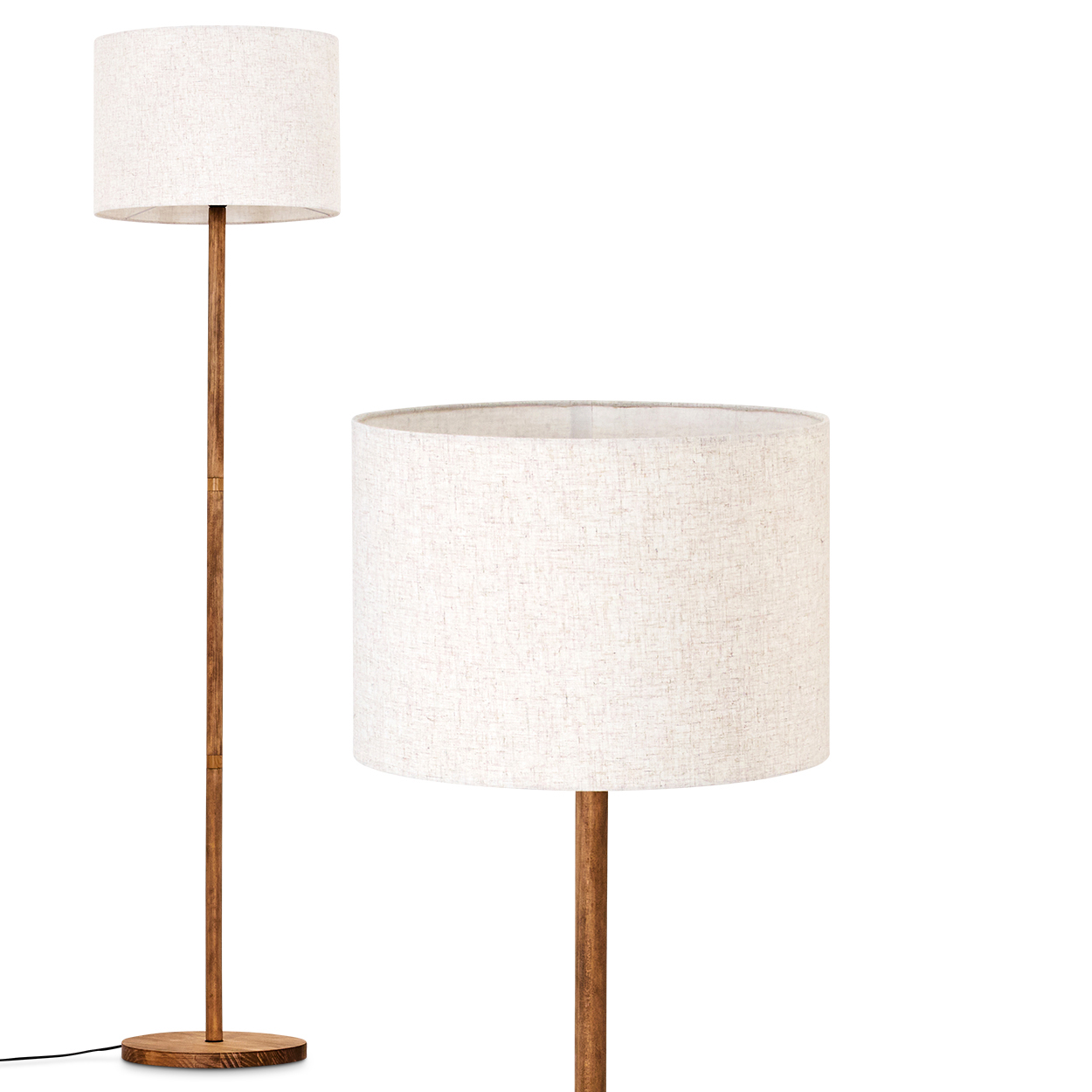 Eine Stehlampe mit weißem Lampenschirm und Holzständer, isoliert auf weißem Hintergrund.