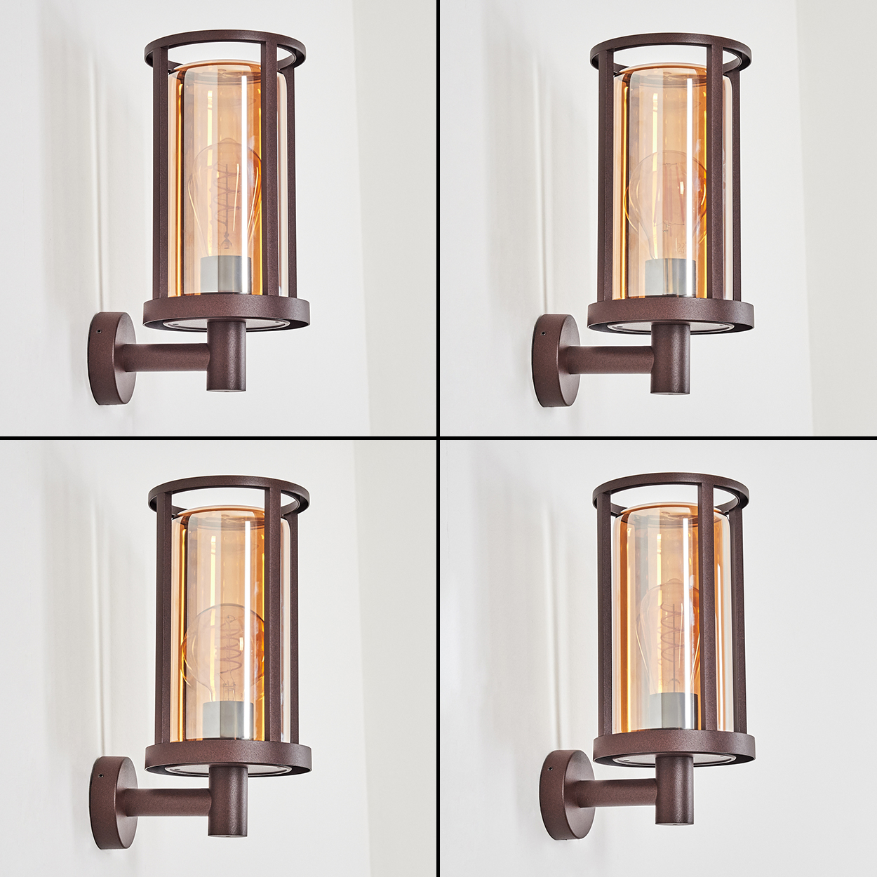 Vier Wandlampen mit braunen Rahmen und bernsteinfarbenen Glasschirmen an einer weißen Wand.
