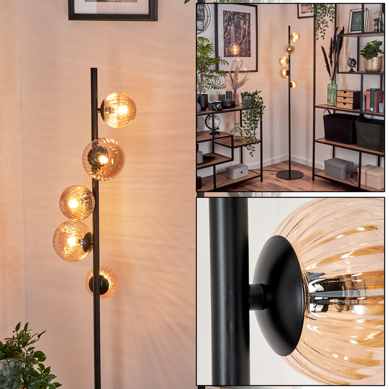 Stehlampe mit bernsteinfarbenen Glaskugeln und einer schwarzen Metallstange. Die Lampe ist beleuchtet.