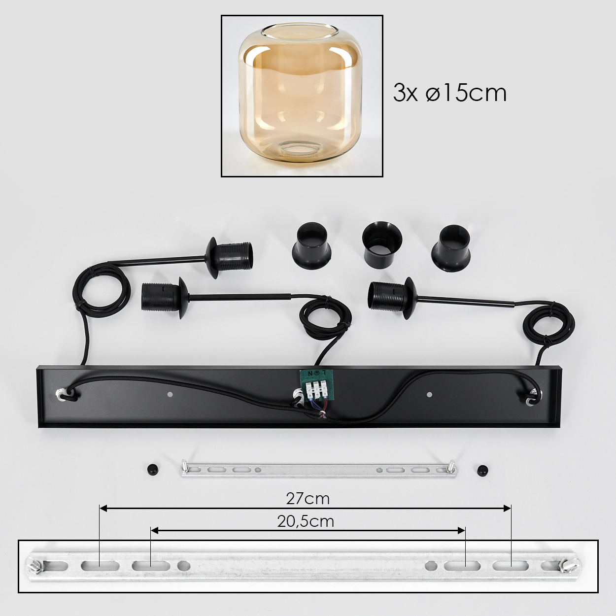 Teile einer linearen Lampe: rechteckige bernsteinfarbene Glasschirme, Befestigungsmaterial und der zentrale schwarze Balken.