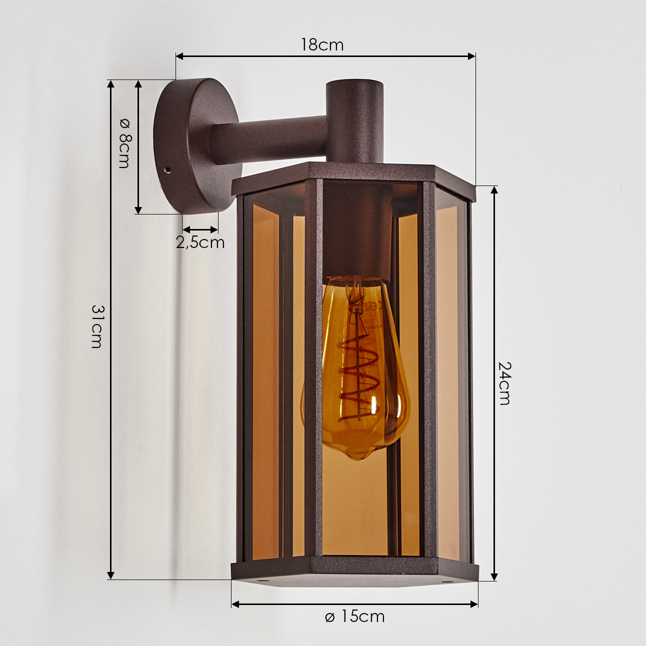 Wandleuchte mit Abmessungen, mit einem Bronzerahmen, bernsteinfarbenem Glas und einer Glühbirne.