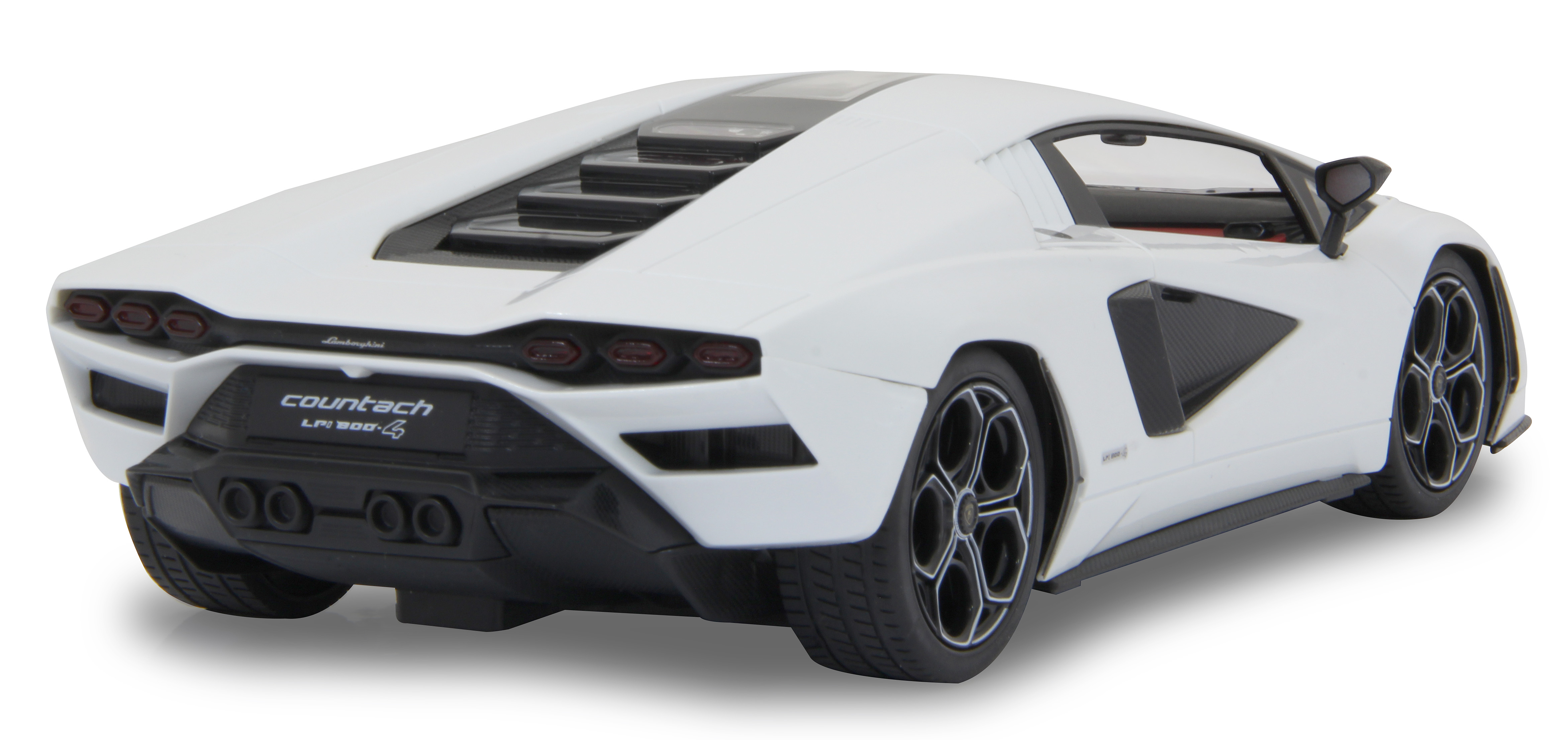 Weißes Lamborghini Countach Spielzeugauto. Rückansicht, schwarze Details, rote Rücklichter. Isoliert auf Weiß.