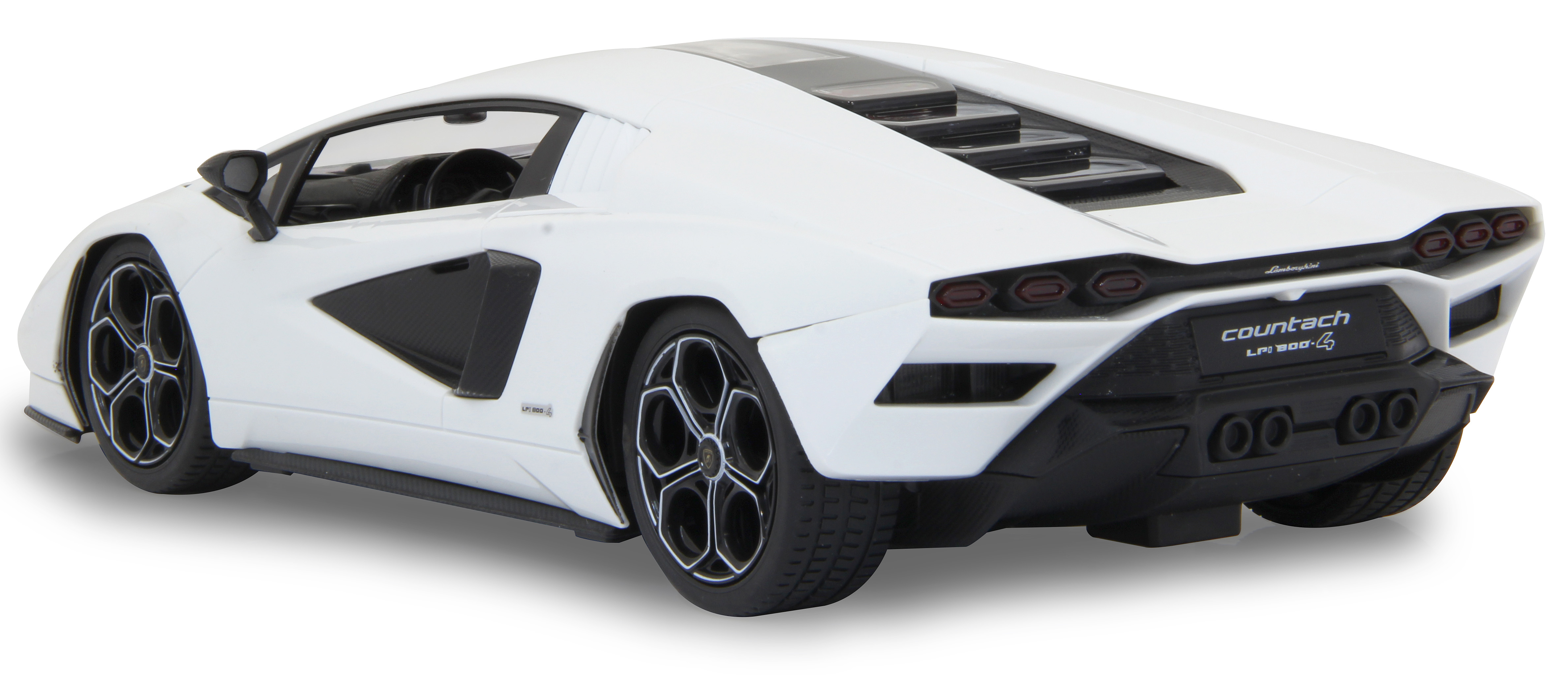 Weißes Lamborghini Countach Spielzeugauto. Rückansicht, schwarze Details, Auspuffrohre. Isoliert auf Weiß.