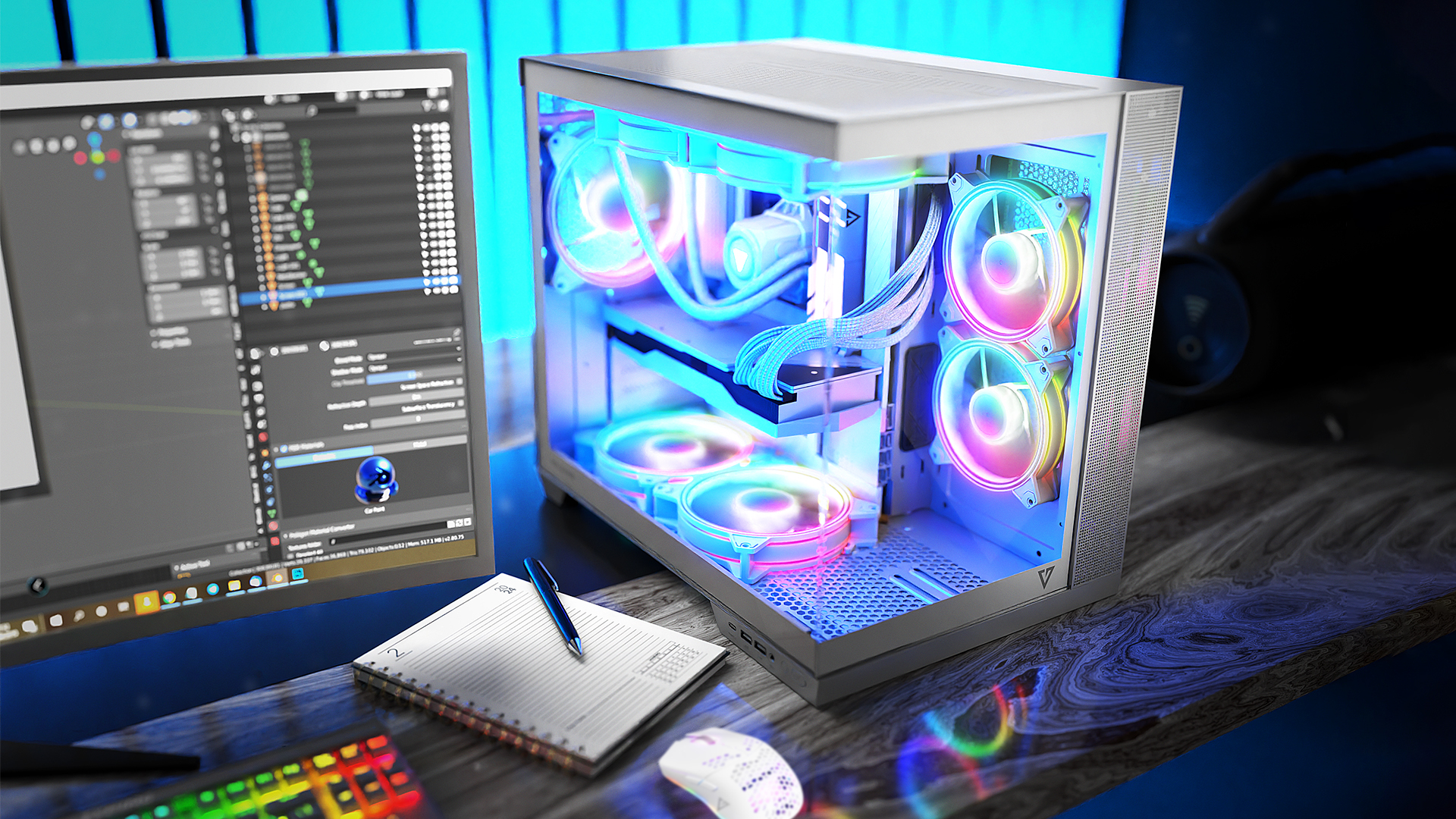 Obudowa komputera z oświetleniem RGB, obok monitora, klawiatury i myszy na biurku.