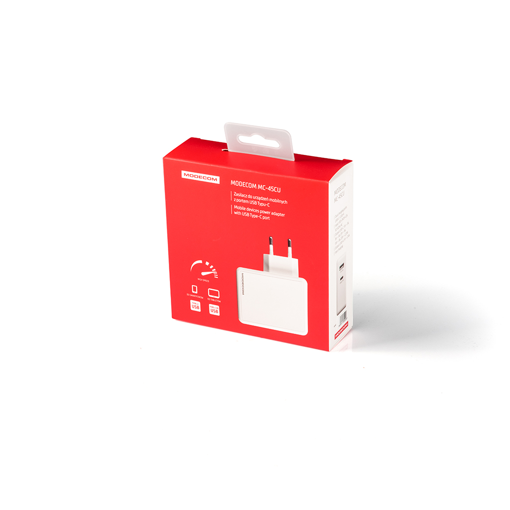 Czerwono-białe pudełko ładowarki mobilnej z USB Type-C. Biała ładowarka w środku.
