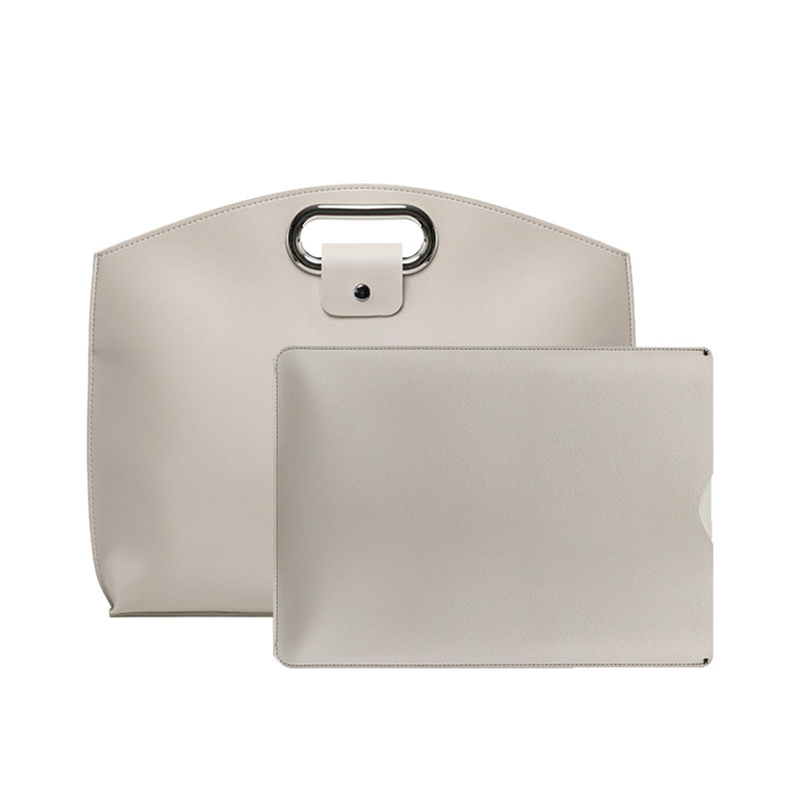 Hellgraue Handtasche mit passendem Ärmel. Weißer Hintergrund.