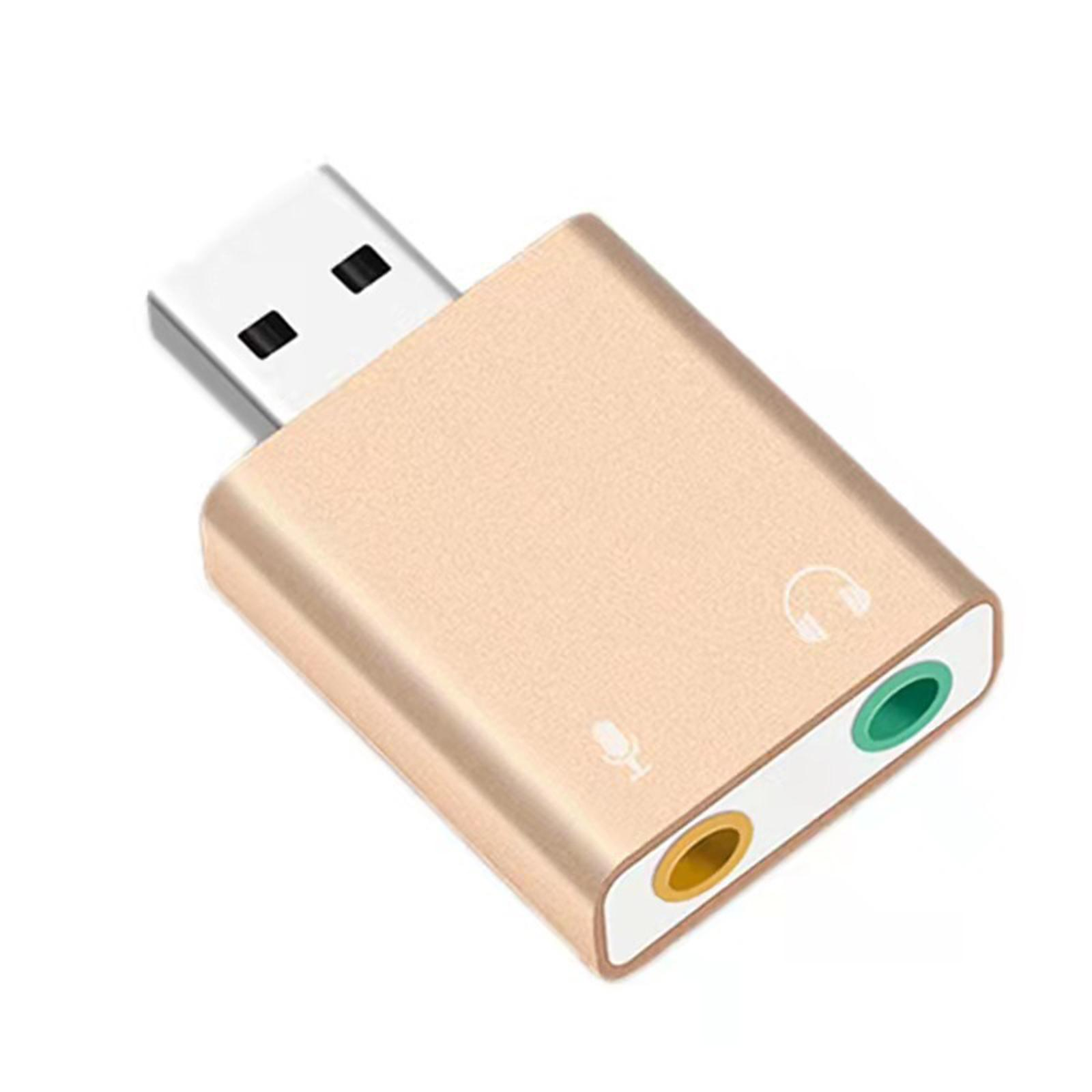 Goldener USB-Audioadapter mit Mikrofon- und Kopfhöreranschlüssen. Weißer Hintergrund.