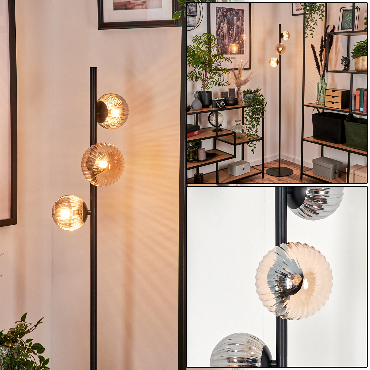 Eine schwarze Stehlampe mit drei Glaskugelleuchten. Die Lampe steht neben Pflanzen und einem Regal.