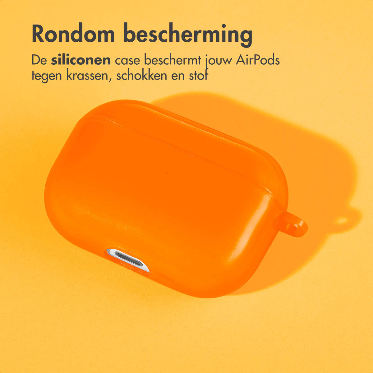 Orange AirPods case. Text about protection against scratches, shocks, and dust. Yellow background.