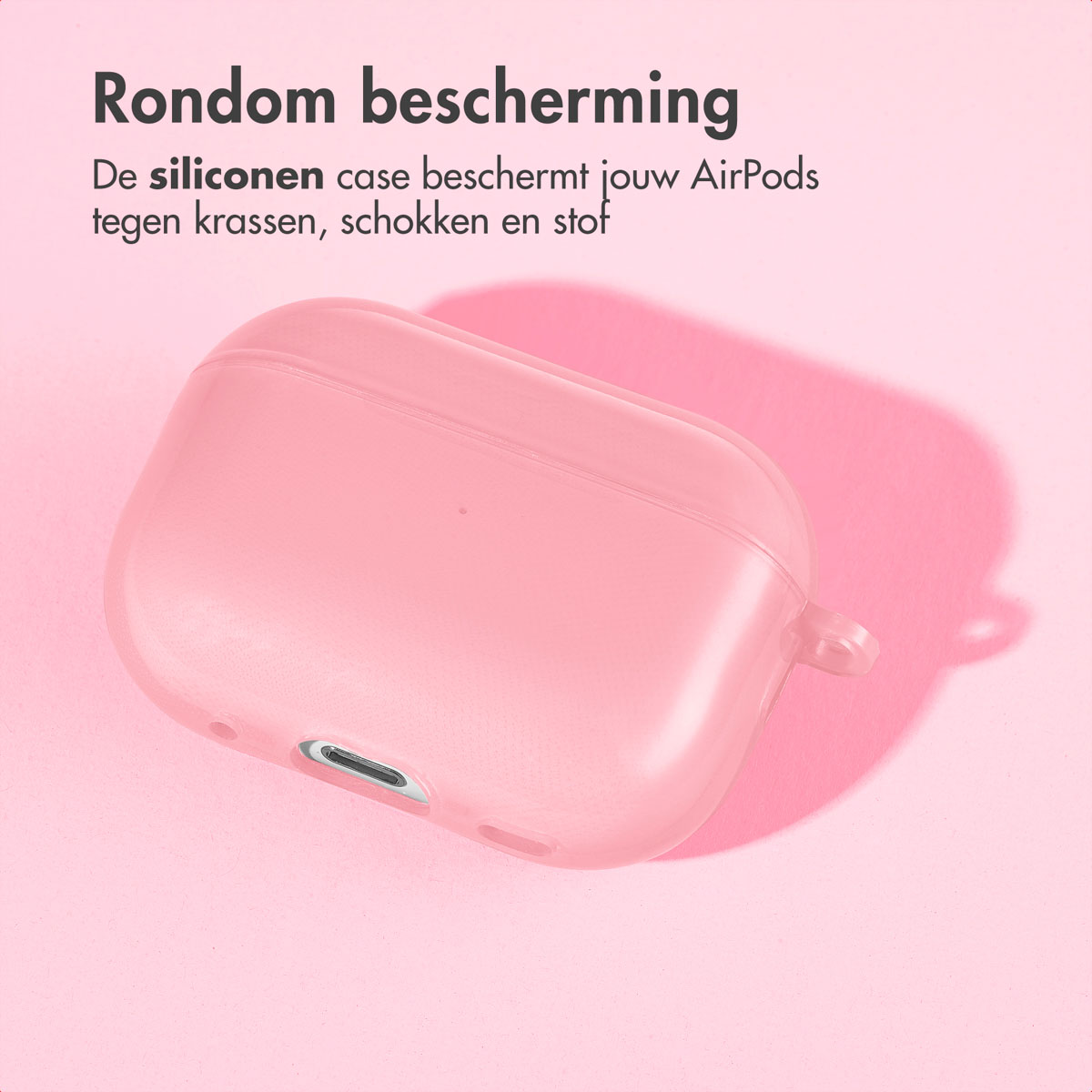 Pink AirPods case on pink background. The case casts a shadow. 