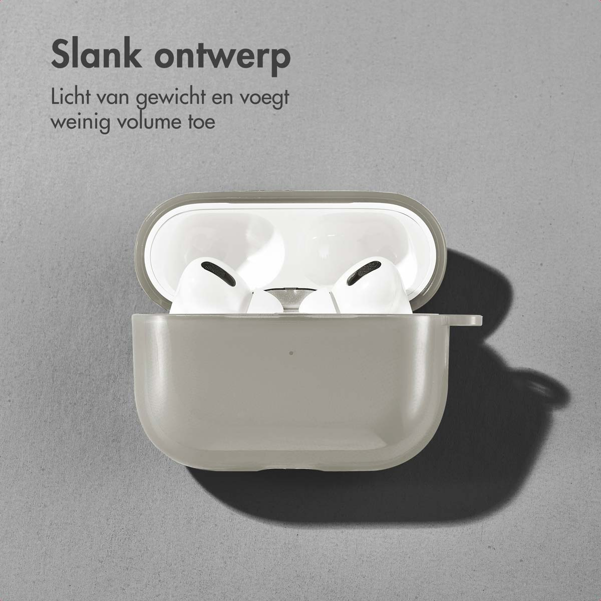 An open grey AirPods case with white AirPods inside. Background is grey.