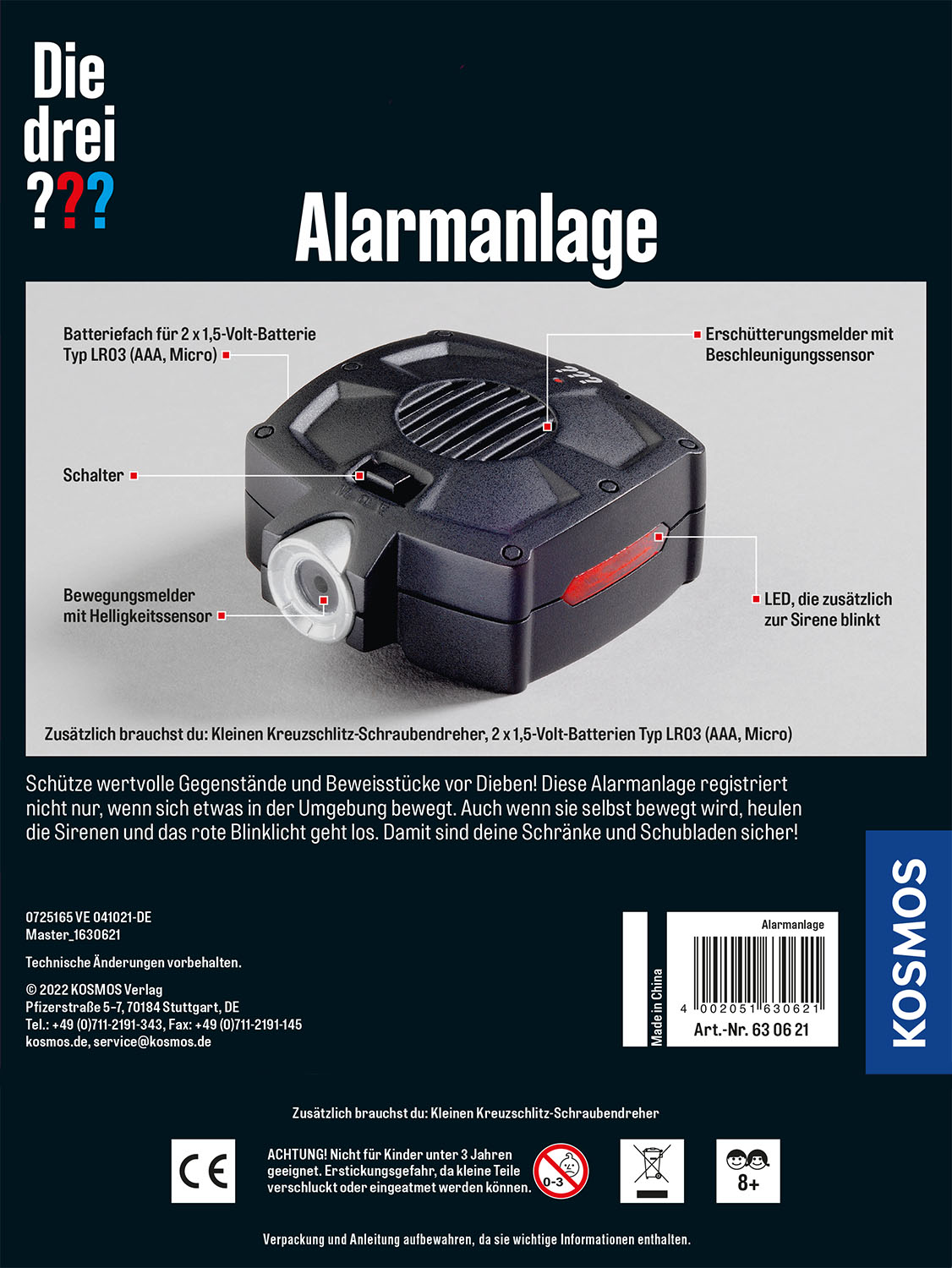 Box mit Alarmanlage und Zubehör. Text auf Deutsch.