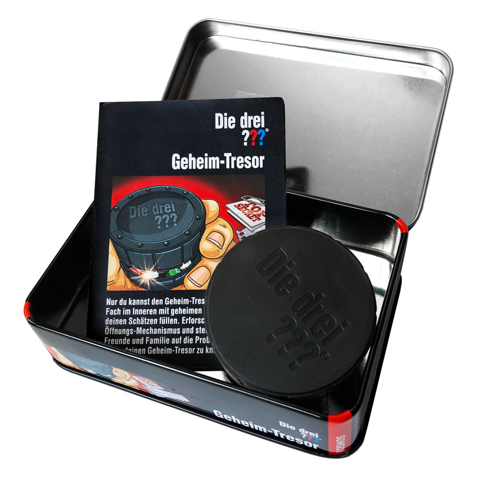 Spielbox, 'Die drei ??? Geheim-Tresor', mit schwarzem Tresor und Hand mit Edelsteinen, auf weißem Grund.