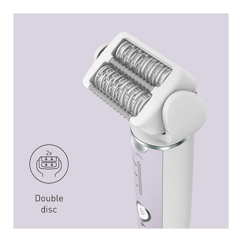 Zbliżenie głowicy golarki, biała i fioletowa golarka z podwójnym dyskiem.