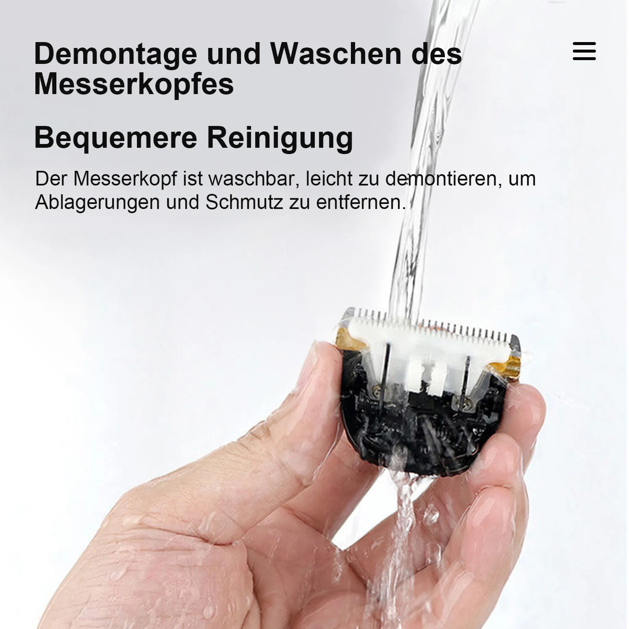 Eine Hand hält einen Scherkopf zum Reinigen unter fließendem Wasser.