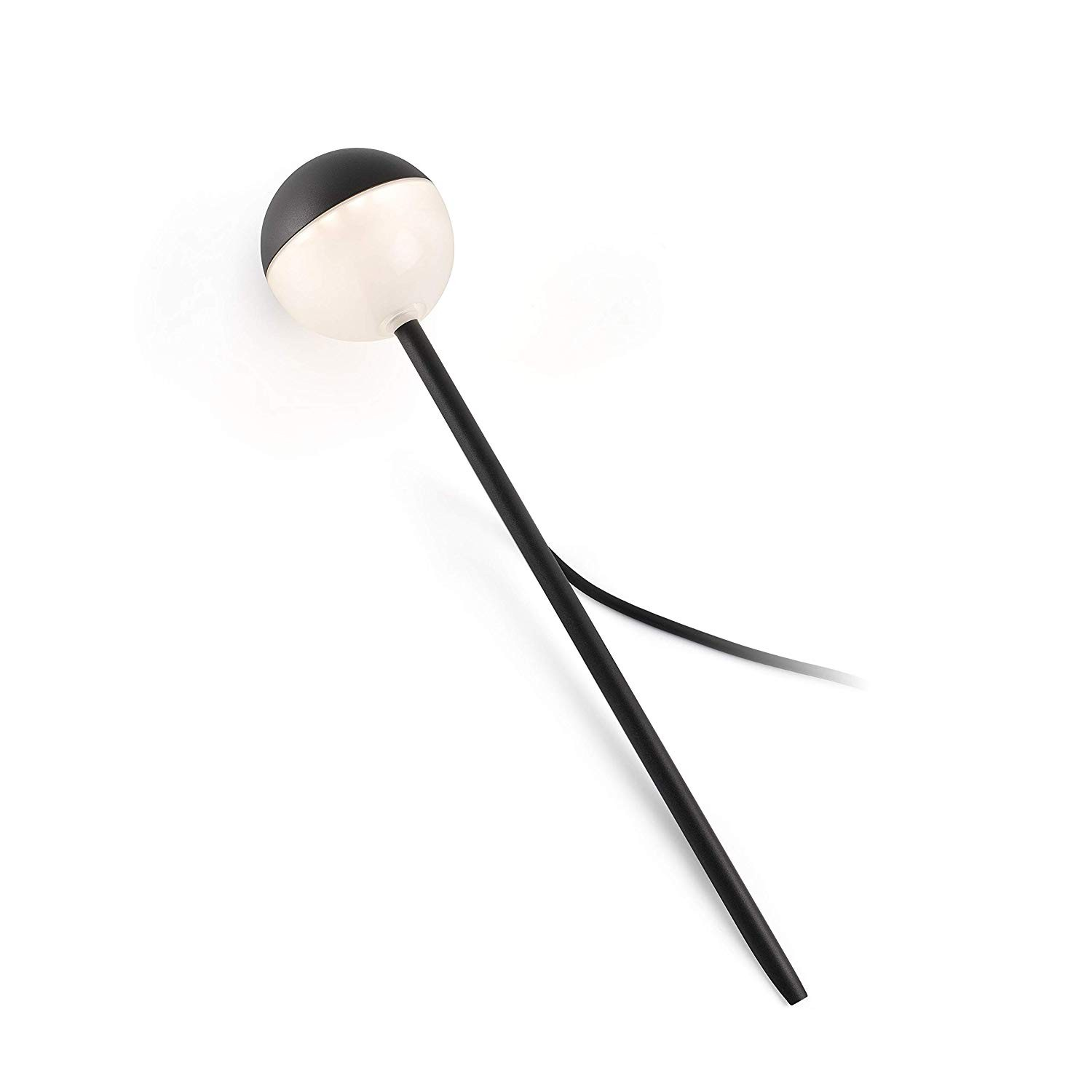 Una lampada a forma di lecca-lecca bianca e nera su sfondo bianco.