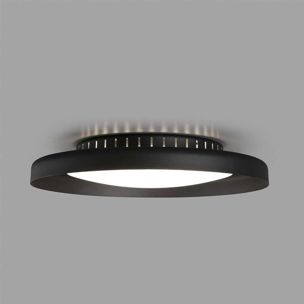 Lampada da soffitto circolare nera su sfondo grigio chiaro.