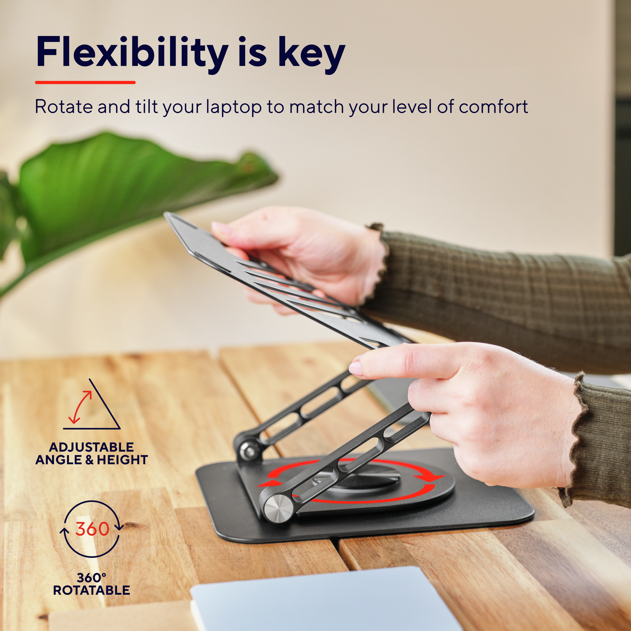 Stojak na laptopa. Stojak jest czarny i umożliwia obracanie i regulację kąta dla wygody.