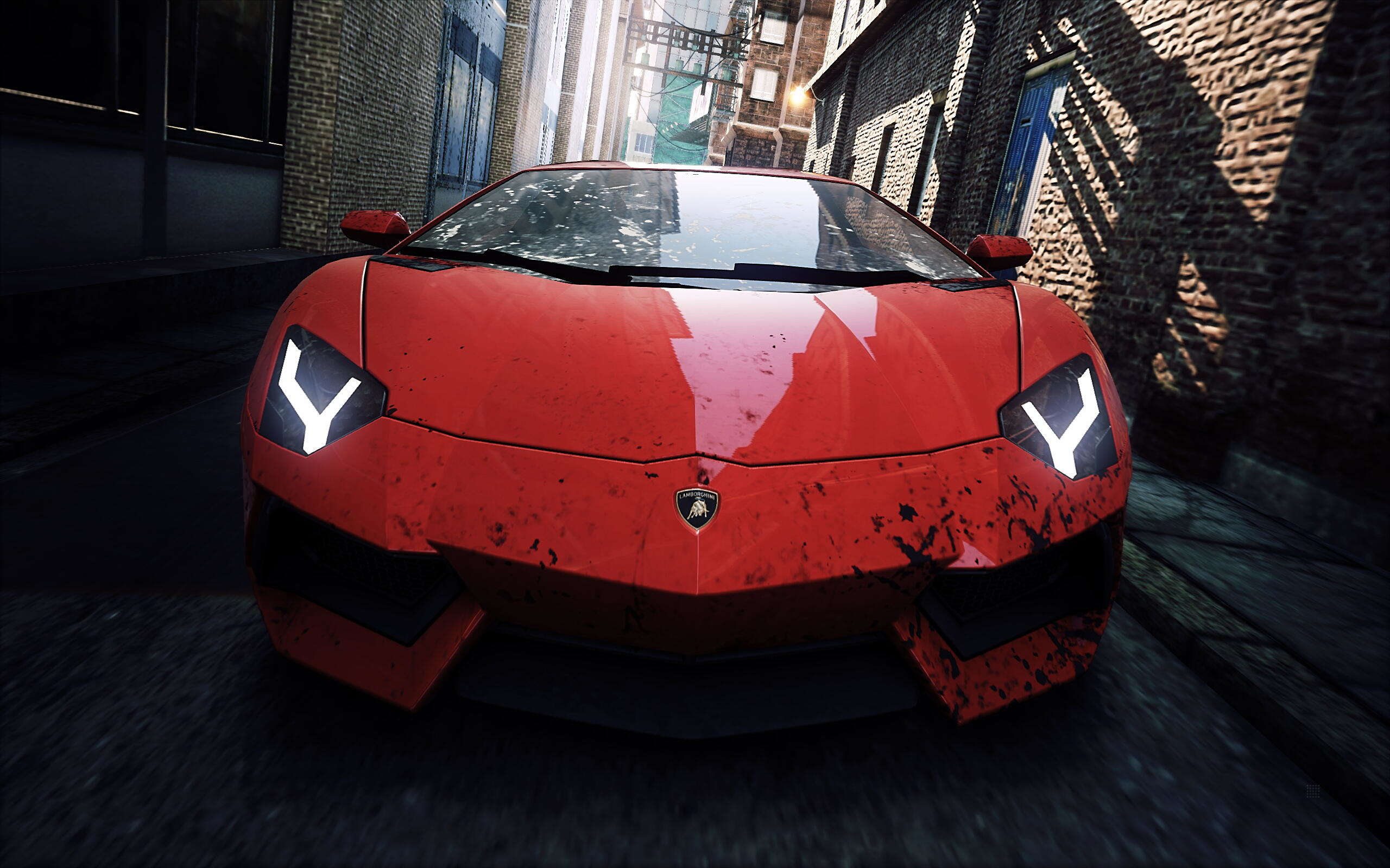 Ein roter Lamborghini-Sportwagen. Das Auto steht mitten auf einer Straße. Dunkler Hintergrund.