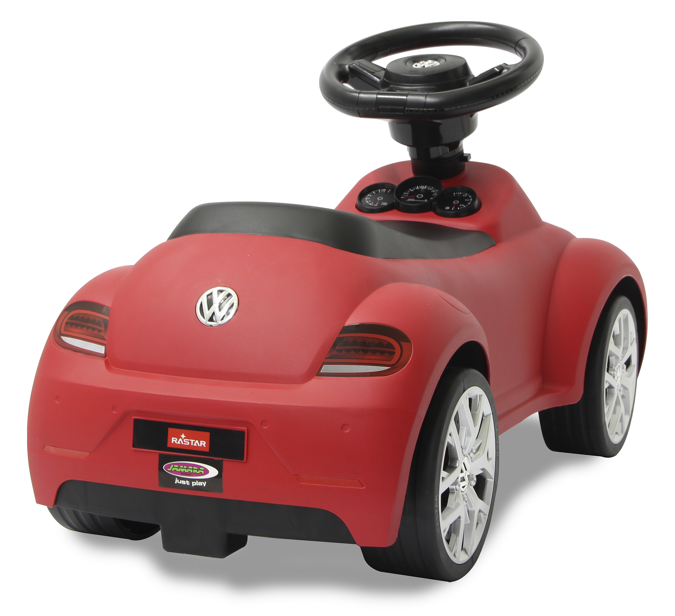 Un'auto giocattolo rossa con volante e logo Volkswagen.