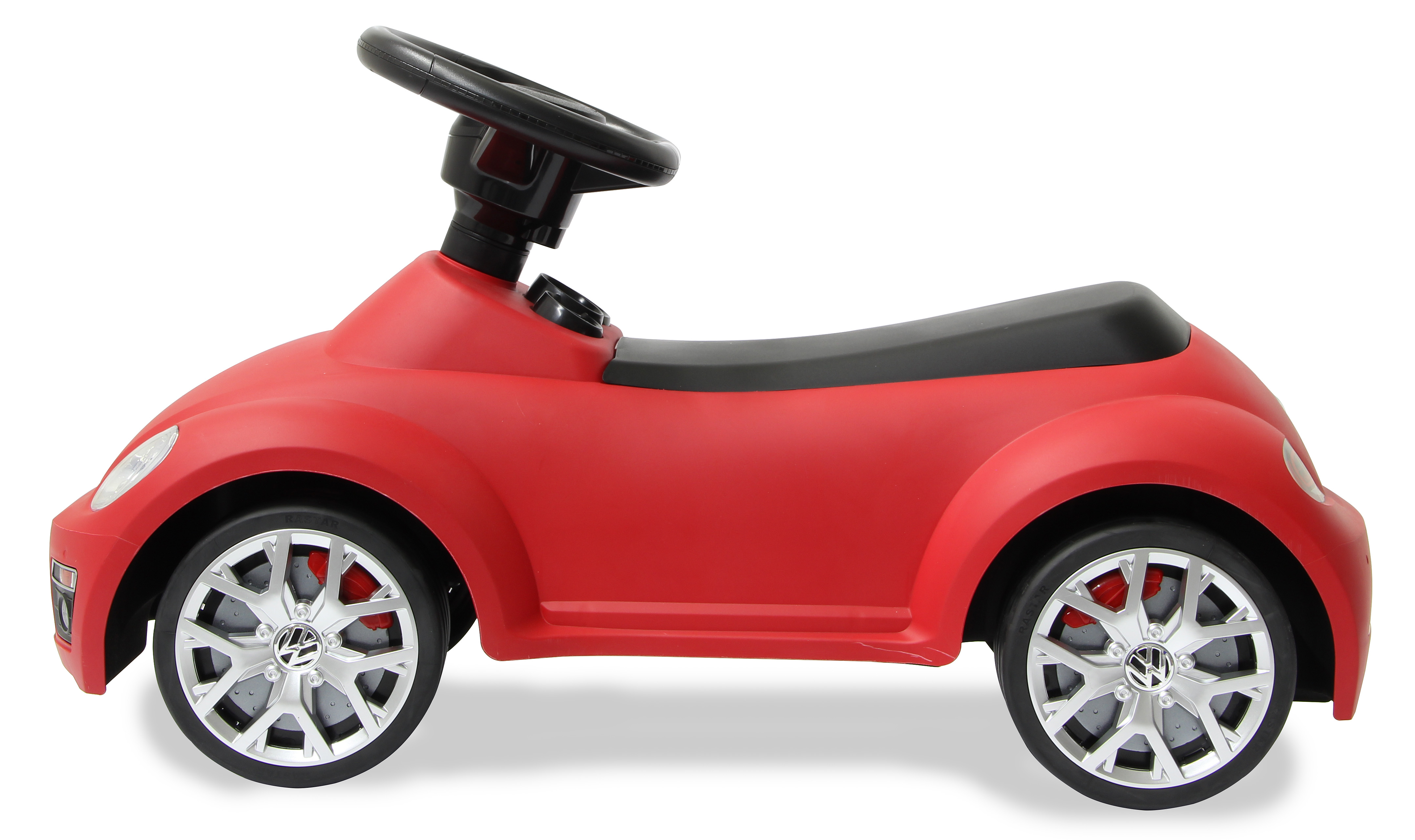 Macchina giocattolo rossa con volante nero, sfondo bianco.