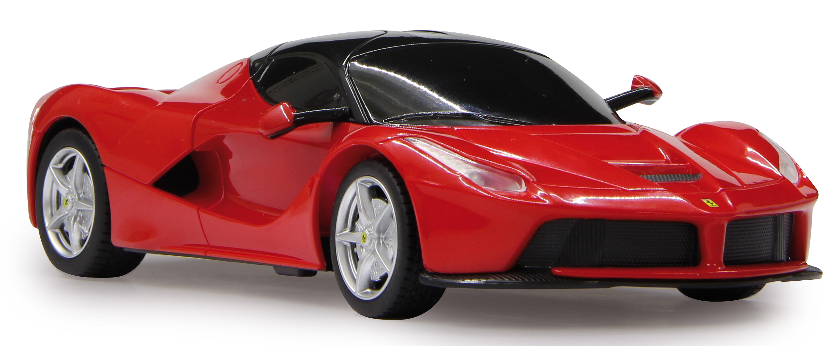 Czerwony samochód zabawkowy Ferrari LaFerrari. Czarny dach i srebrne koła. Białe tło.