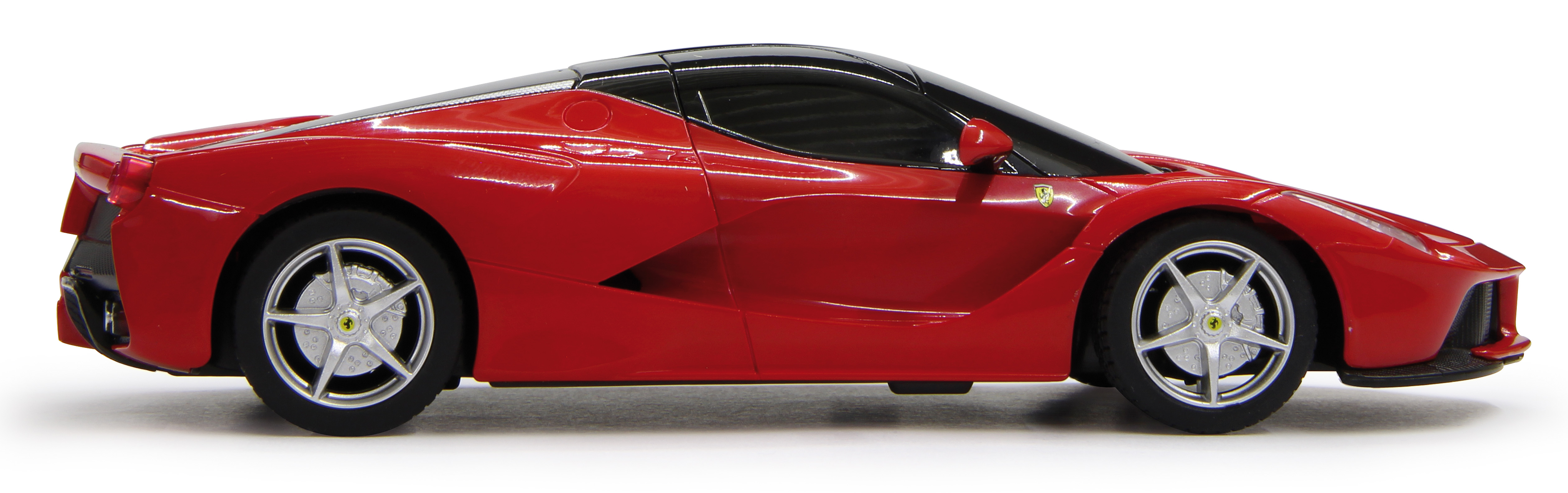 Czerwony samochód sportowy Ferrari z czarnym dachem, na białym tle.