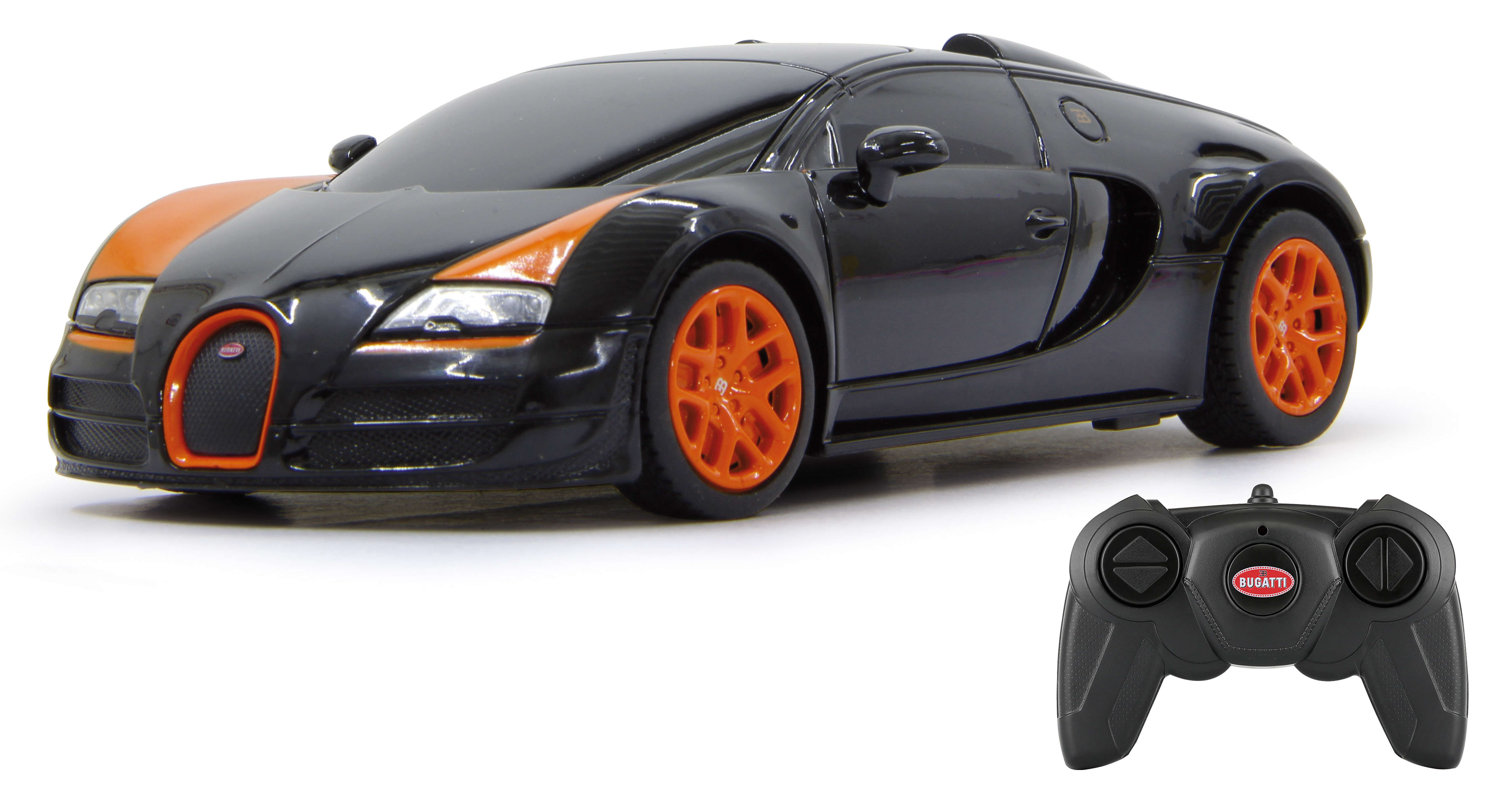 Czarny i pomarańczowy samochód zabawkowy Bugatti Veyron. Pilot w prawym dolnym rogu. Białe tło.