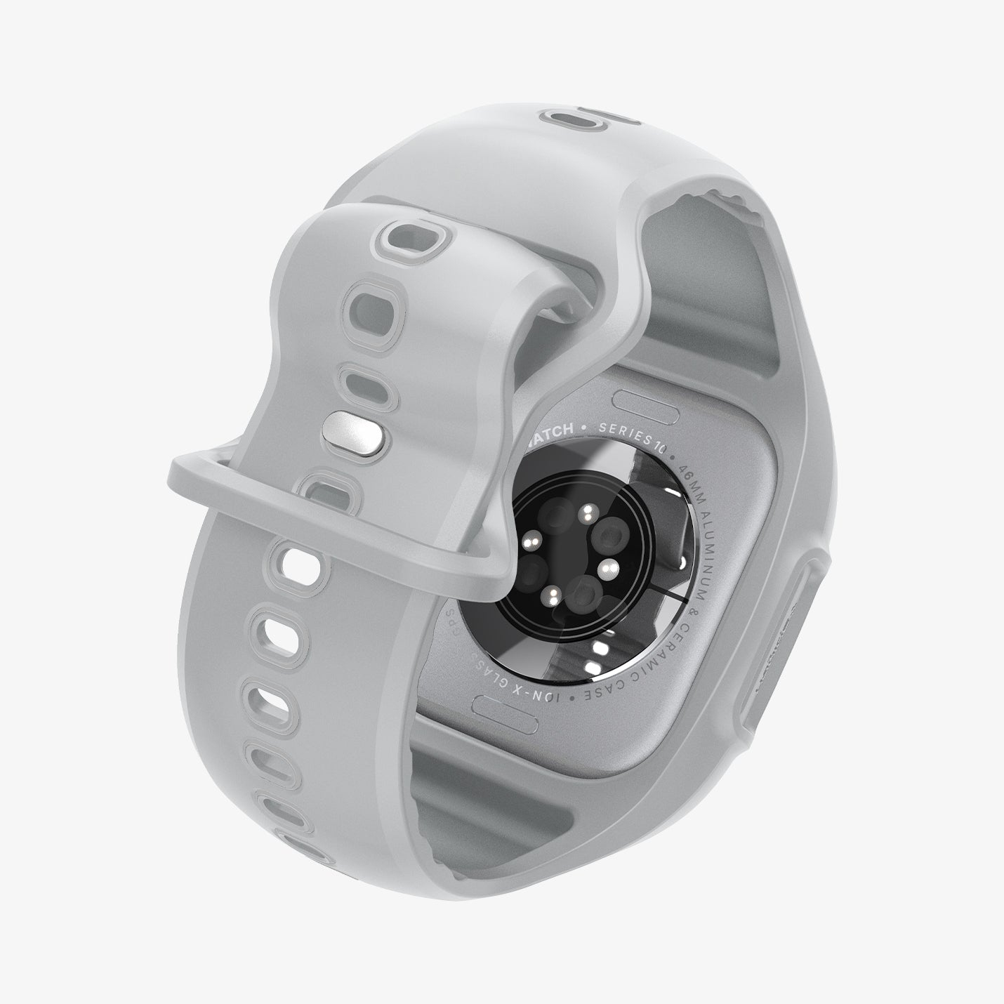 Szary Apple Watch w szarej obudowie ochronnej. Zegarek jest na białej powierzchni.