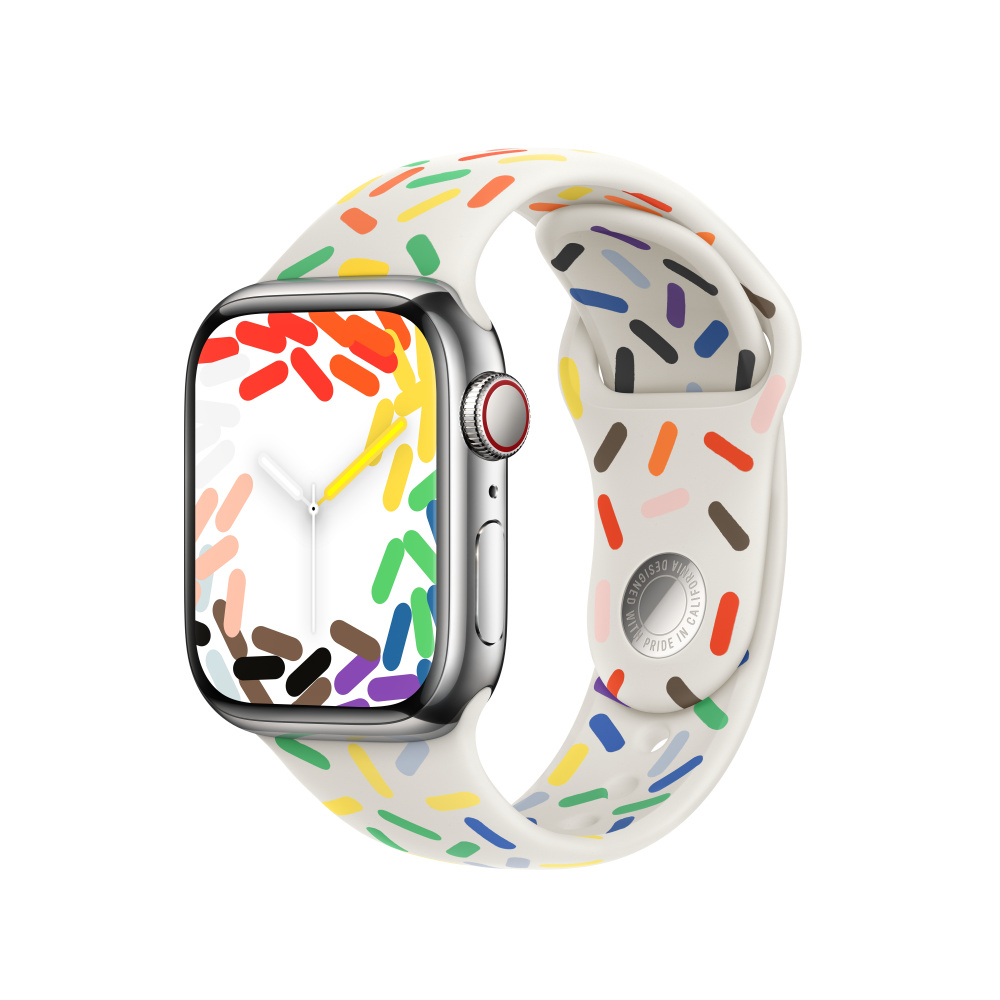 Apple Watch mit weißem Band mit bunten Streuseln, farbenfrohes Display.
