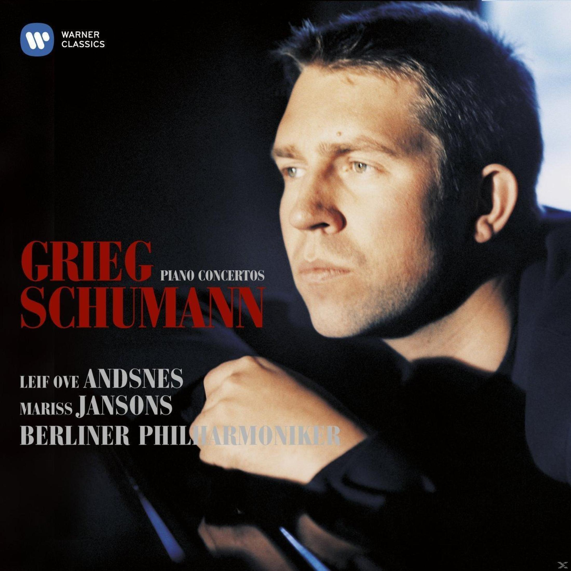 Couverture d'album avec un portrait d'homme. Le titre indique 'Grieg Schumann'. Les interprètes et l'orchestre sont listés. Fond sombre.